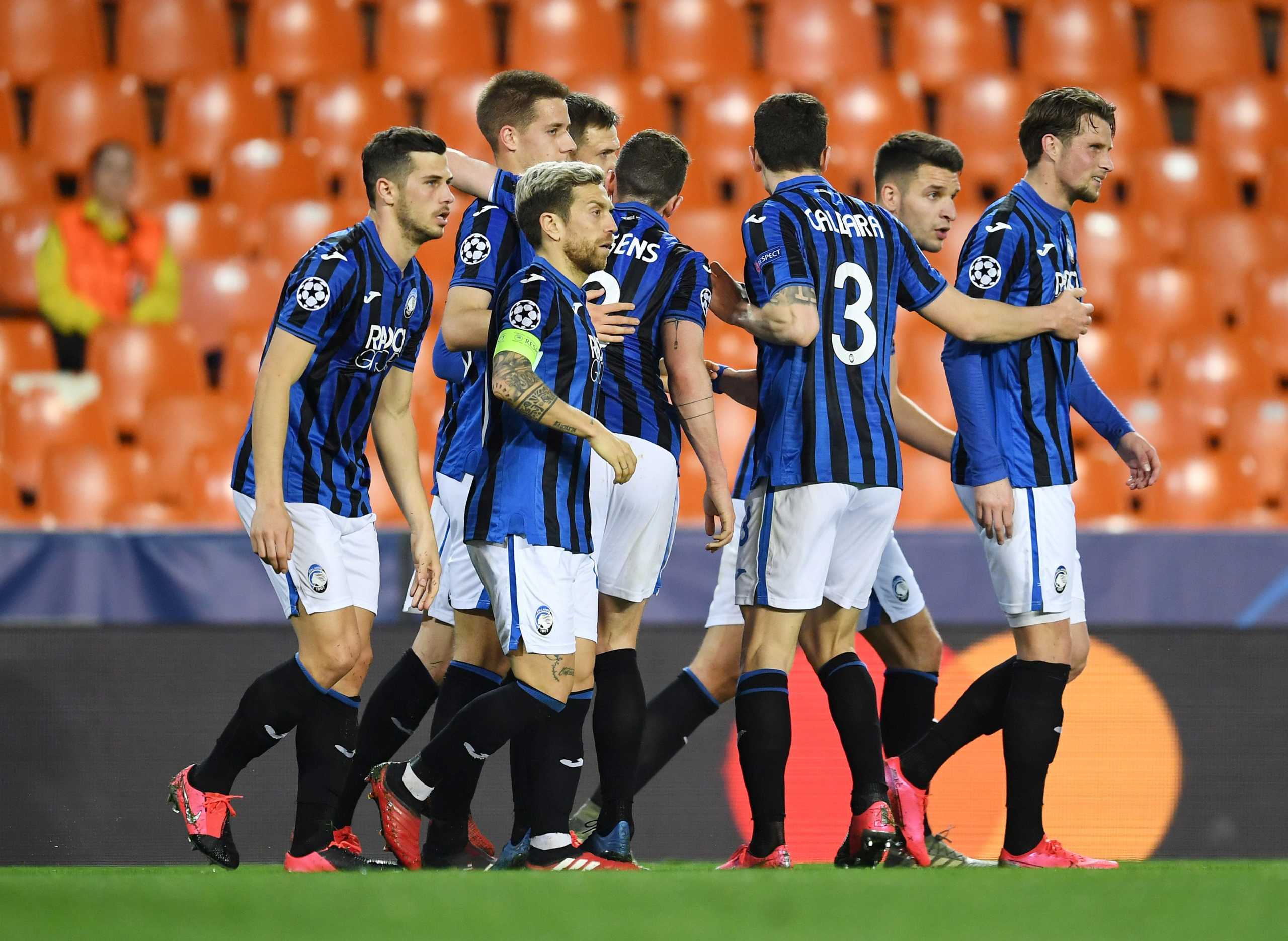 Soccer Football - Champions League - Round of 16 Second Leg - Valencia v Atalanta - Mestalla, Valencia, Spain - March 10, 2020  Atalanta's Josip Ilicic celebrates scoring their second goal with teammates  UEFA Pool
