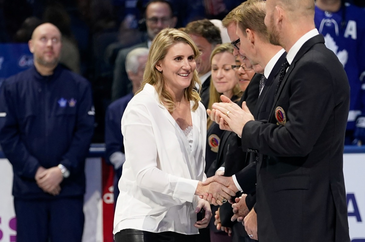 FILE PHOTO: Nov 15, 2019; Toronto, Ontario, CAN; Class of 2019 Hockey Hall of Fame inductee Hayley Wickenheiser shakes hands with hall of famers prior to a game between the Boston Bruins and Toronto Maple Leafs at Scotiabank Arena. Mandatory Credit: John E. Sokolowski-USA TODAY Sports
