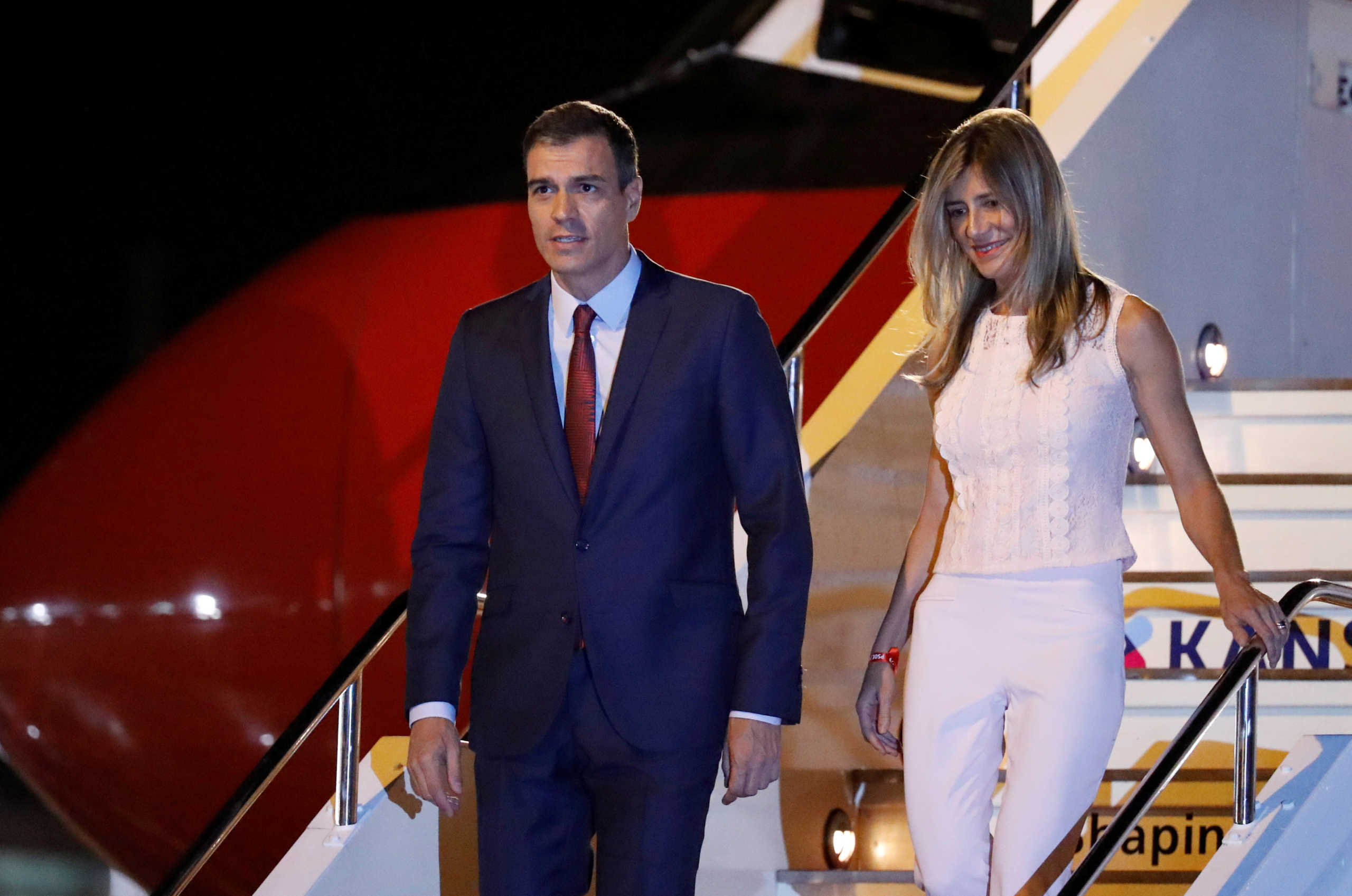 FILE PHOTO: Spain's Prime Minister Pedro Sanchez and his wife Maria Begona Gomez Fernandez arrive ahead of the G20 leaders summit in Osaka, Japan June 27, 2019. REUTERS