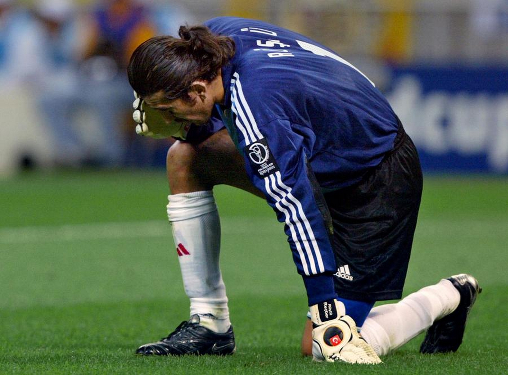 EH048 - 20020626 - SAITAMA, JAPAN : Turkey's goalkeeper Rustu Recber reacts after failing to make a save of Brazilian forward Ronaldo's offensive at the Turkish goal in match 62 of the 2002 FIFA World Cup Korea Japan semifinals 26 June, 2002 in Saitama, Japan.
EPA PHOTO AFPI