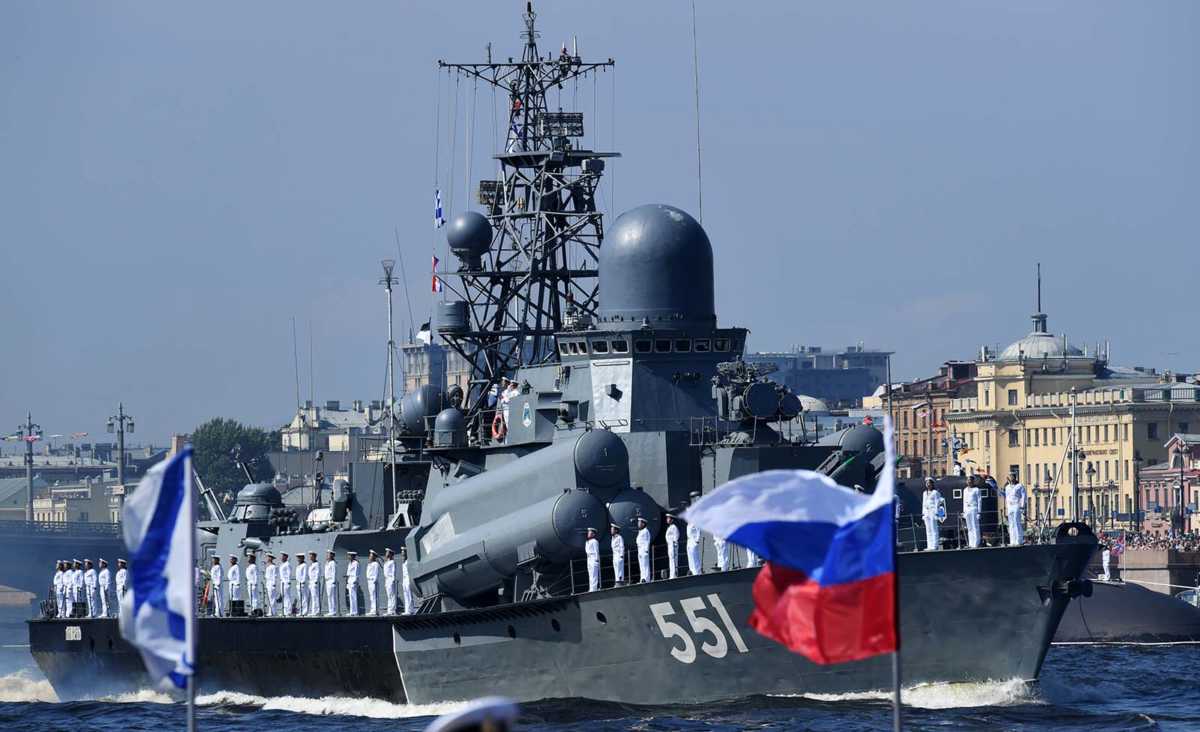 Russian warships sail on the Neva river during the Navy Day parade in Saint Petersburg on July 29, 2018.
