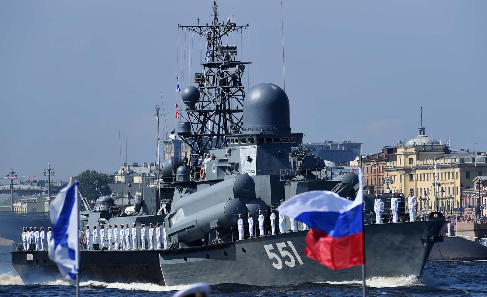 Russian warships sail on the Neva river during the Navy Day parade in Saint Petersburg on July 29, 2018.