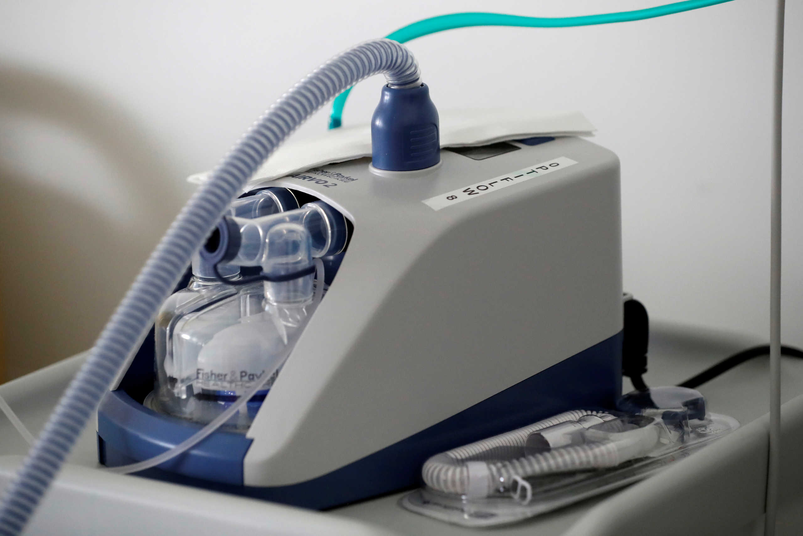 FILE PHOTO: A nasal ventilator is pictured as a patient suffering from coronavirus disease (COVID-19) is treated in a pulmonology unit at the hospital in Vannes, France, March 20, 2020. REUTERS