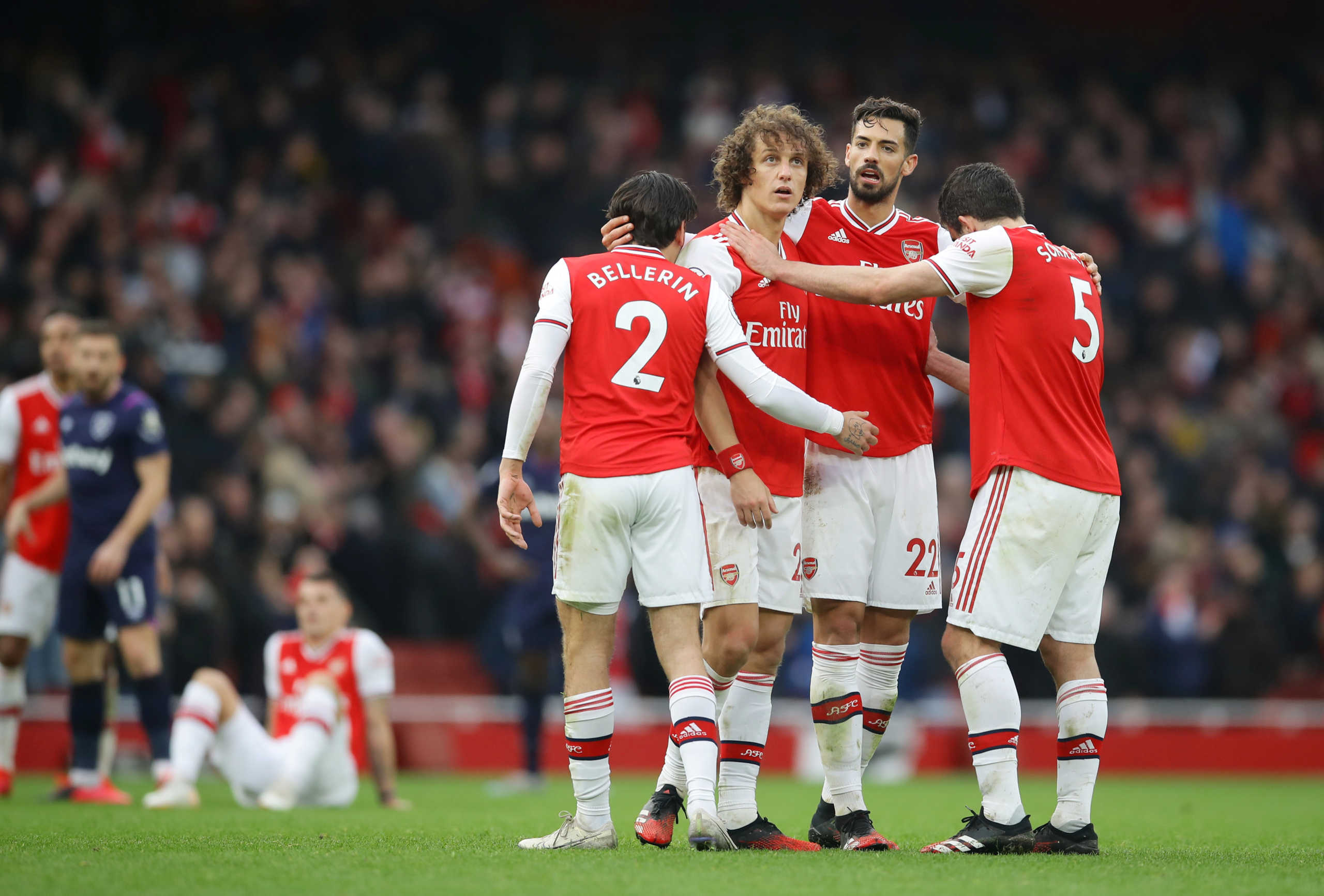 Soccer Football - Premier League - Arsenal v West Ham United - Emirates Stadium, London, Britain - March 7, 2020  Arsenal's Hector Bellerin, David Luiz, Pablo Mari and Sokratis Papastathopoulos celebrate after the match   REUTERS