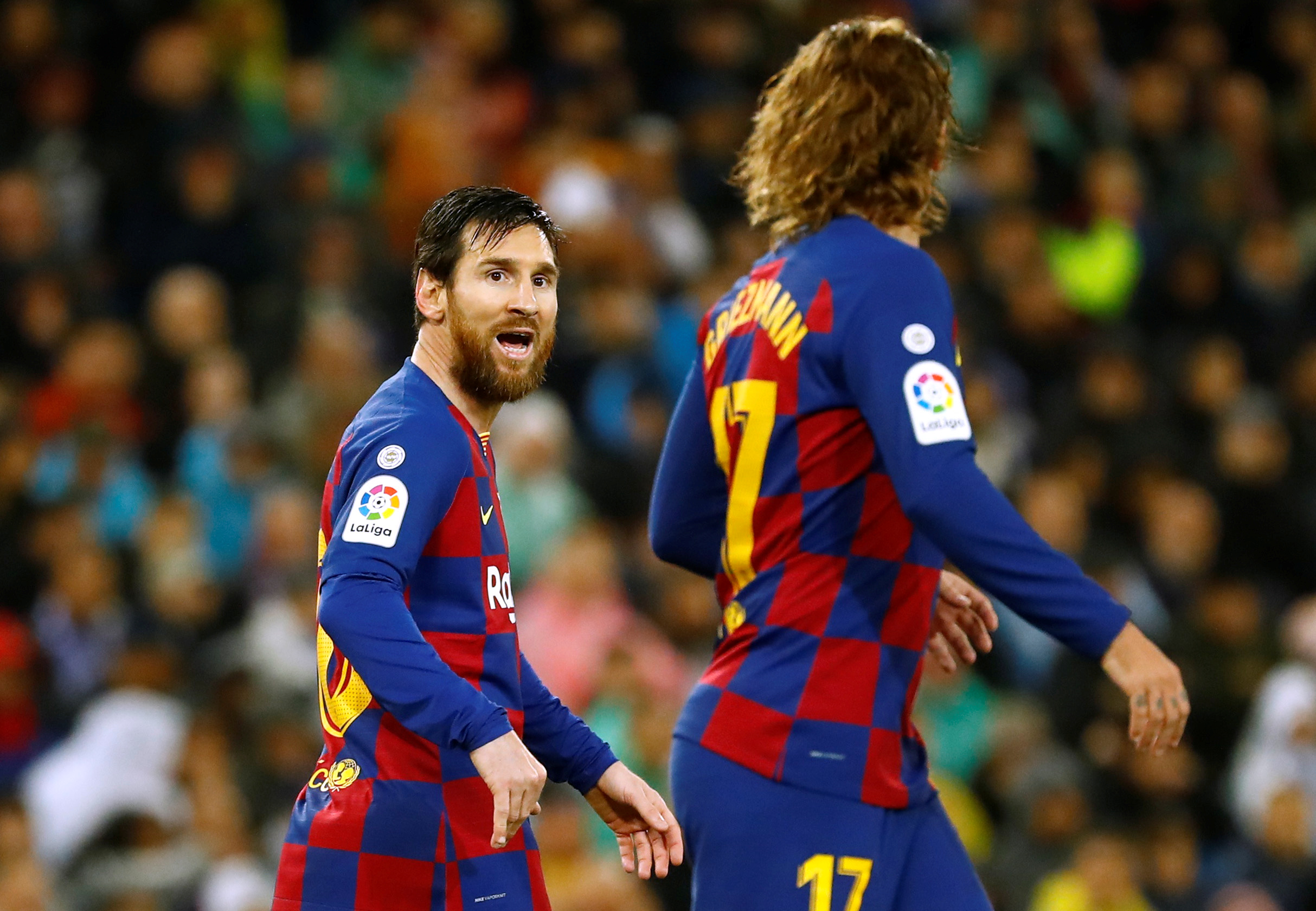 Soccer Football - La Liga Santander - Real Madrid v Barcelona - Santiago Bernabeu, Madrid, Spain - March 1, 2020  Barcelona's Lionel Messi talks to Antoine Griezmann  REUTERS
