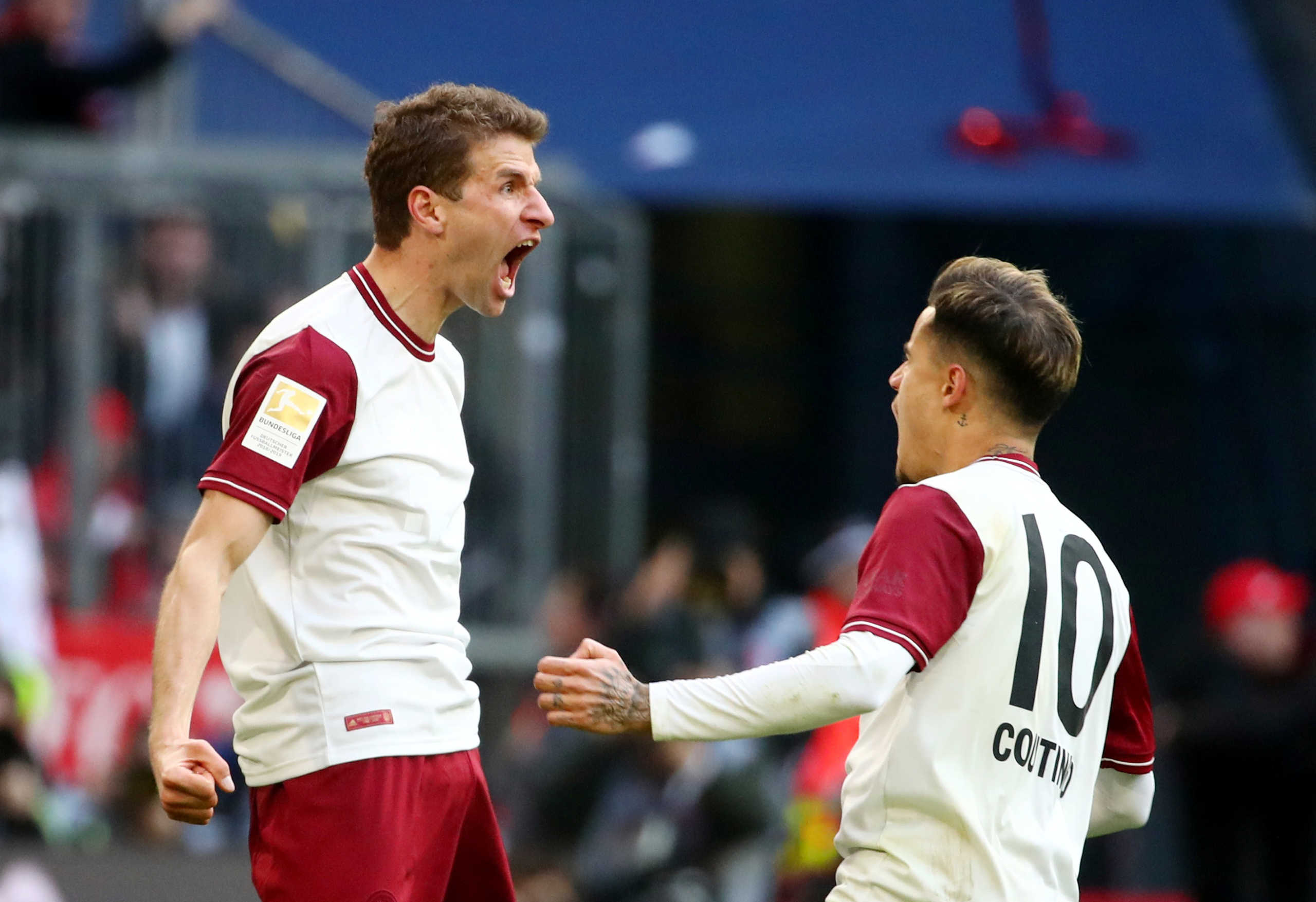 Soccer Football - Bundesliga - Bayern Munich v FC Augsburg - Allianz Arena, Munich, Germany - March 8, 2020  Bayern Munich's Thomas Muller celebrates scoring their first goal   REUTERS