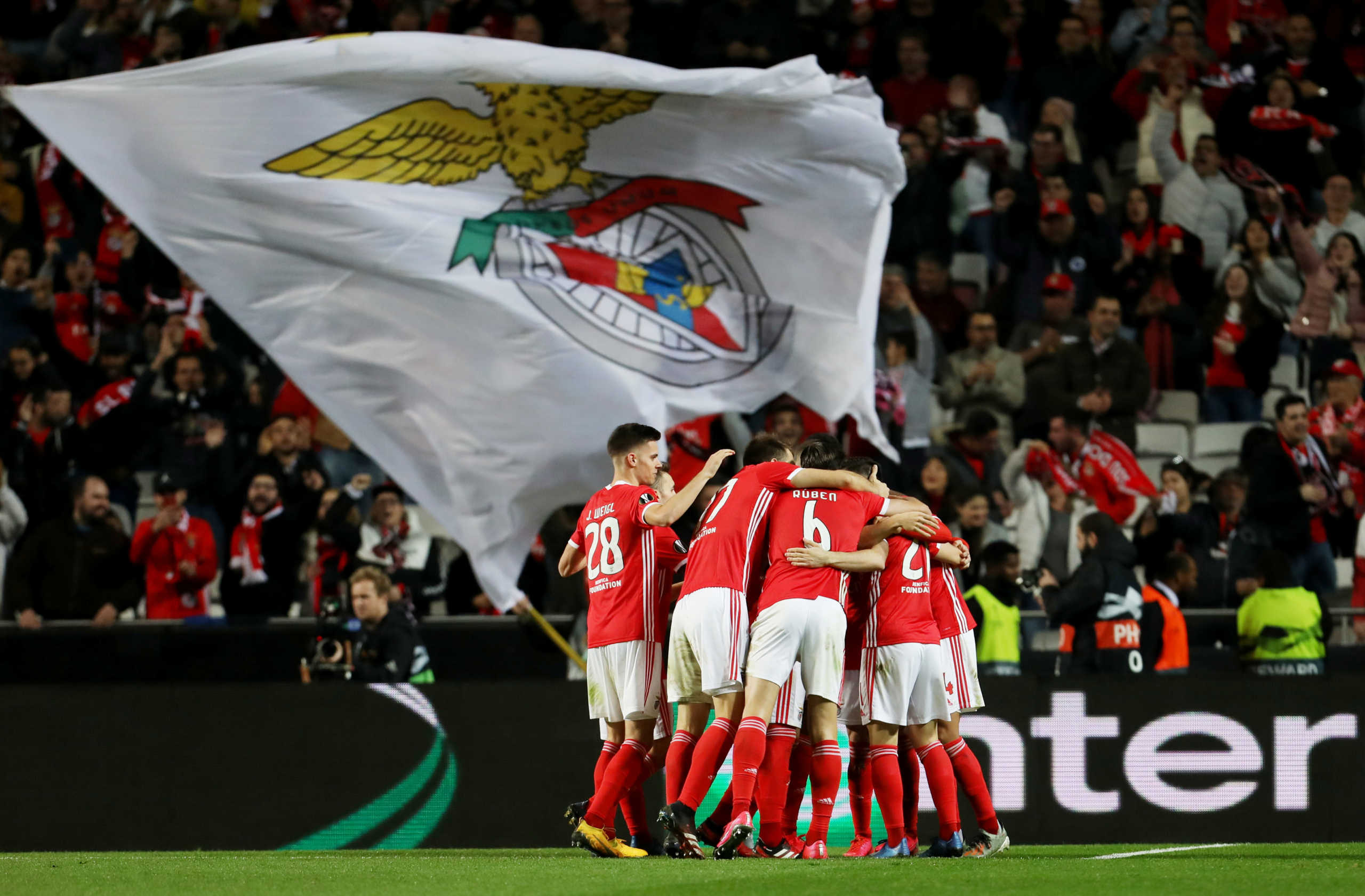 Soccer Football - Europa League - Round of 32 Second Leg - Benfica v Shakhtar Donetsk - Estadio da Luz, Lisbon, Portugal - February 27, 2020  Benfica's Rafa Silva celebrates scoring their third goal with teammates               REUTERS