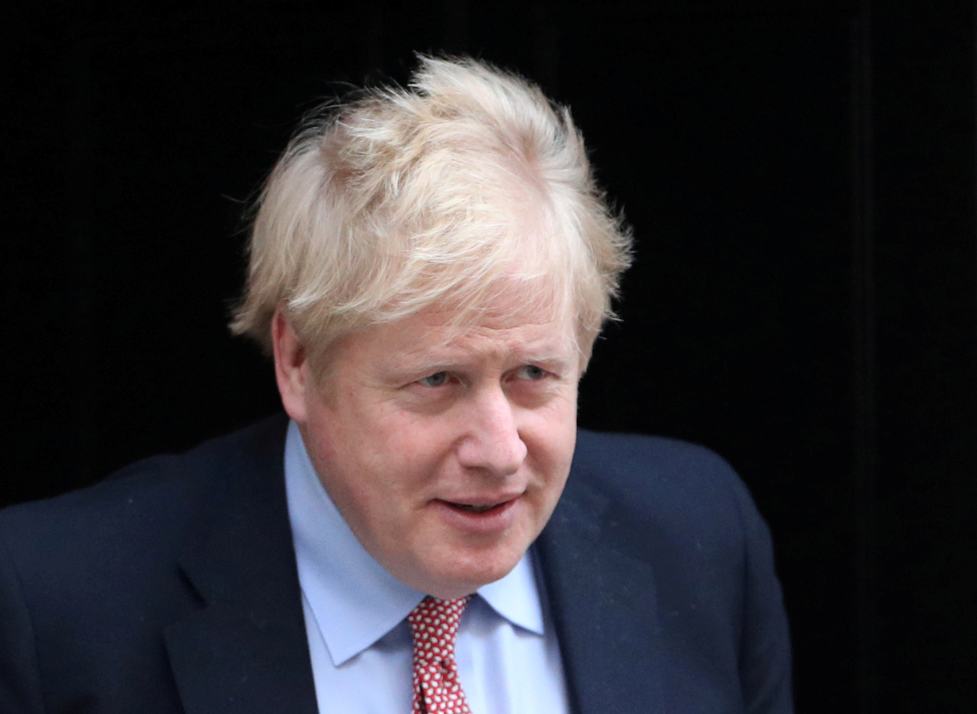 FILE PHOTO: Britain's Prime Minister Boris Johnson leaves Downing Street, as the spread of coronavirus disease (COVID-19) continues. London, Britain, March 25, 2020. REUTERS