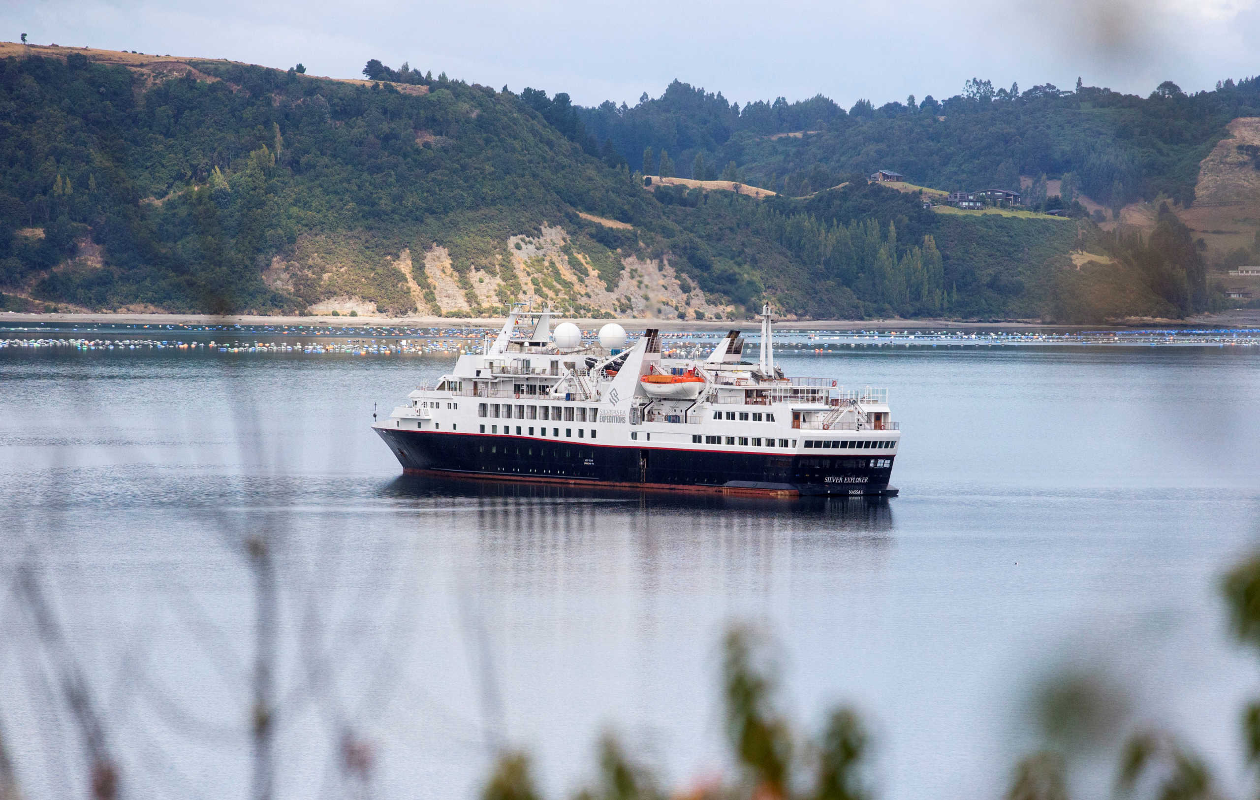 Bahamas flag cruise ship 'Silver explorer' that has been isolated in Chile's southern port of Castro after a passenger showed symptoms similar to those of the coronavirus disease (COVID-19), according to local health authorities, is seen in Chiloe, Chile, March 14, 2020. REUTERS