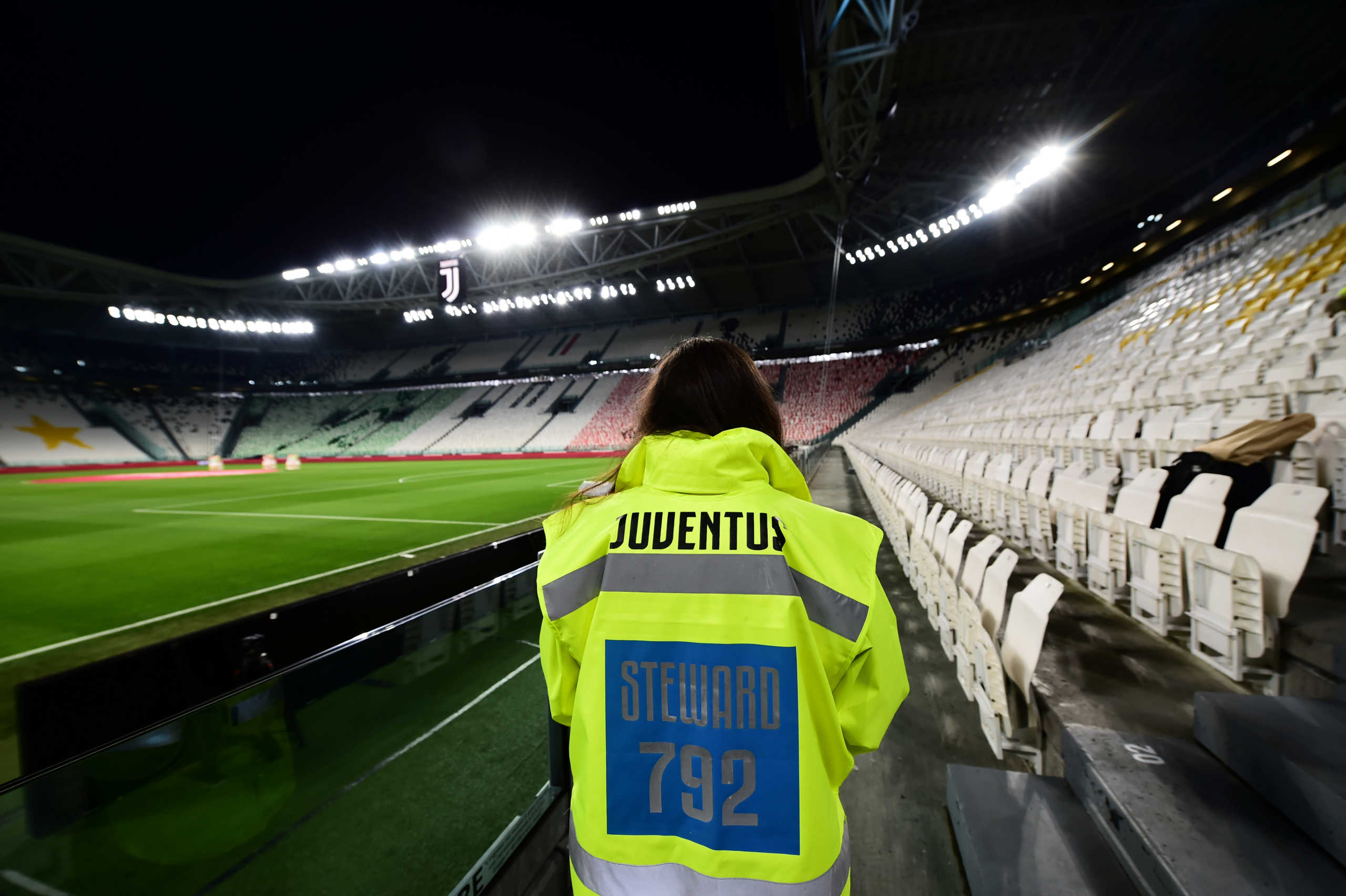 Soccer Football - Serie A - Juventus v Inter Milan - Allianz Stadium, Turin, Italy - March 8, 2020   A steward inside the empty stadium before the match is played behind closed doors as the number of coronavirus cases grows around the world   REUTERS