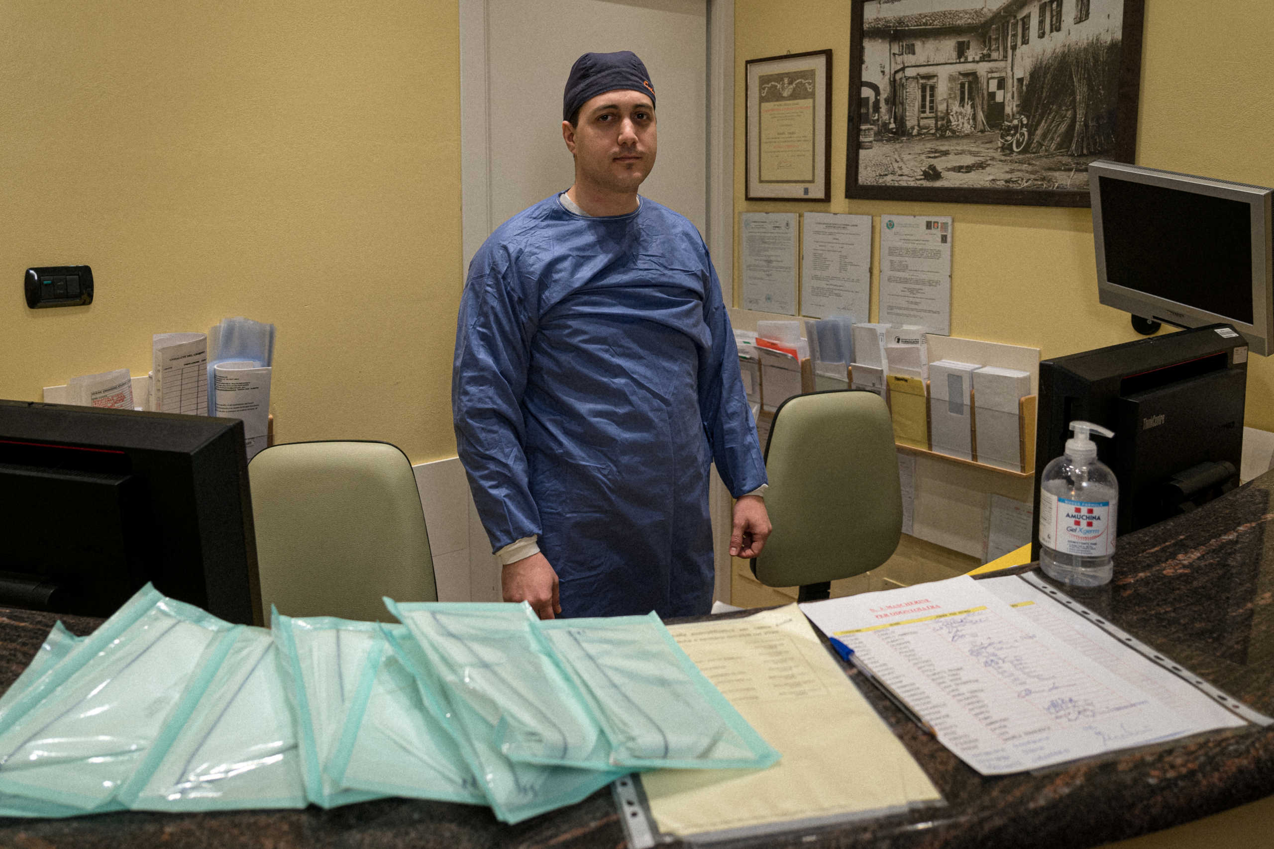 Life inside a red zone: Enrico, a dental hygienist, has been supplying other dentists - usually his competition - with masks, in San Fiorano, one of the towns on lockdown in northern Italy due to a coronavirus outbreak, in this picture taken by schoolteacher Marzio Toniolo, March 3, 2020. Picture taken March 3, 2020. Marzio Toniolo