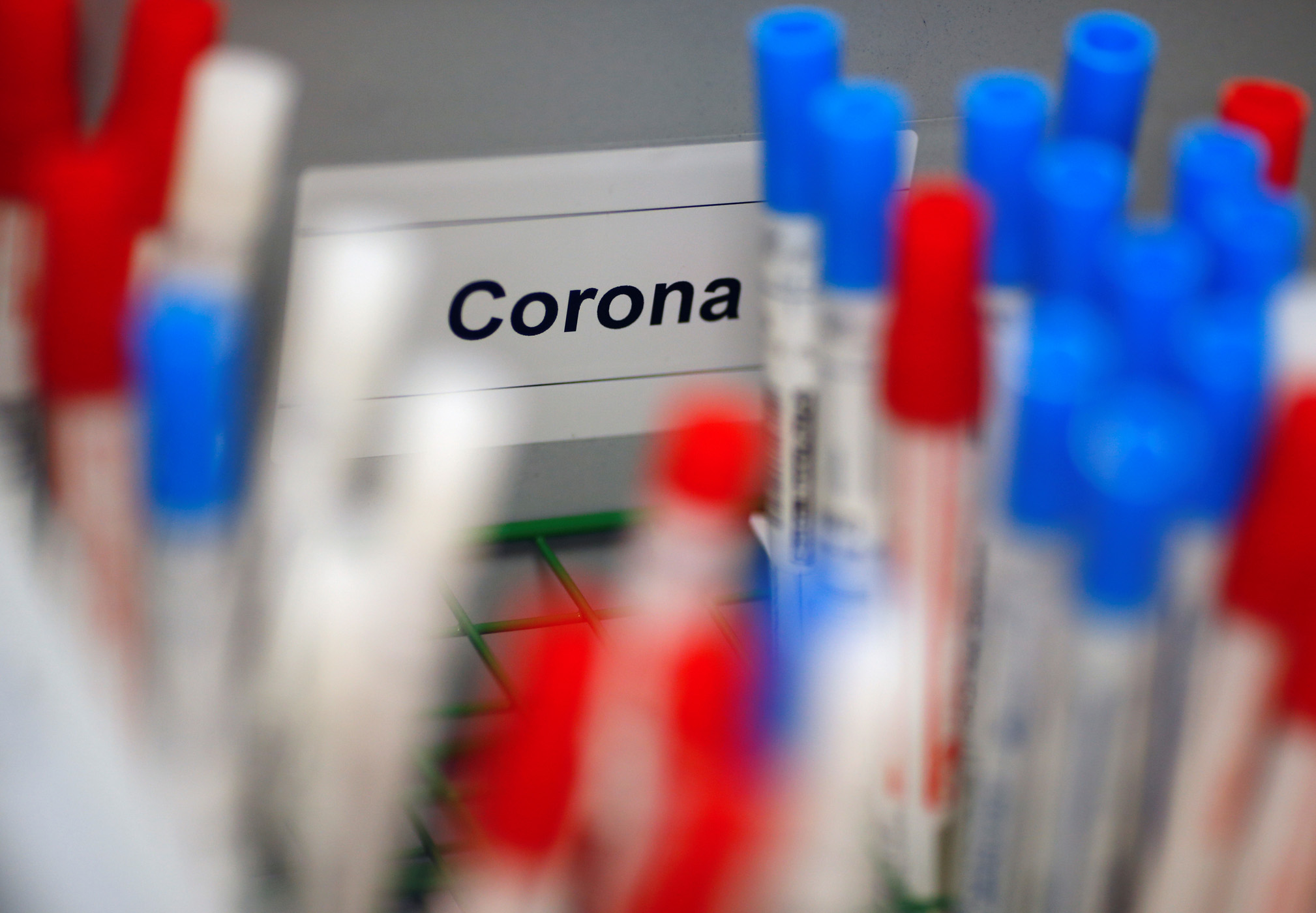 Plastic vials containing tests for the coronavirus are pictured at a medical laboratory in Cologne, Germany, March 24, 2020, as the spread of the coronavirus disease (COVID-19) continues. Picture taken March 24, 2020. REUTERS