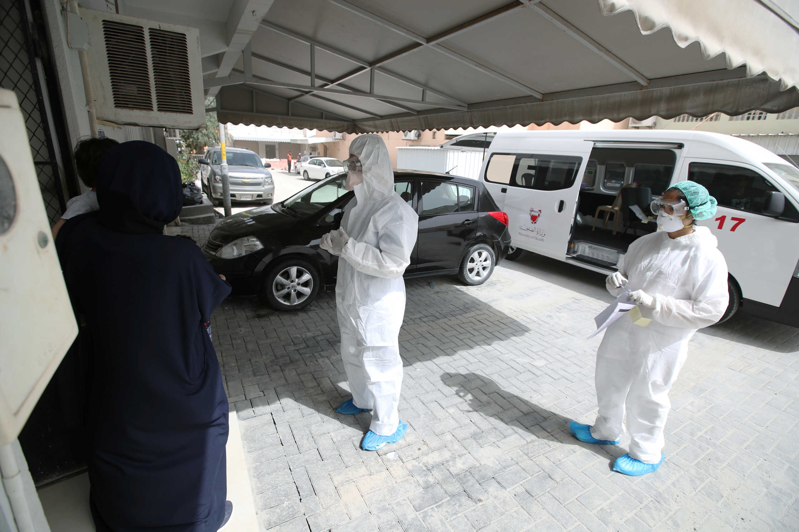 Doctors call a traveler who returned from Iran at their residency, to check if is infected with the novel coronavirus, at Isa Town Health Center, south of Manama, Bahrain, March 2, 2020. REUTERS