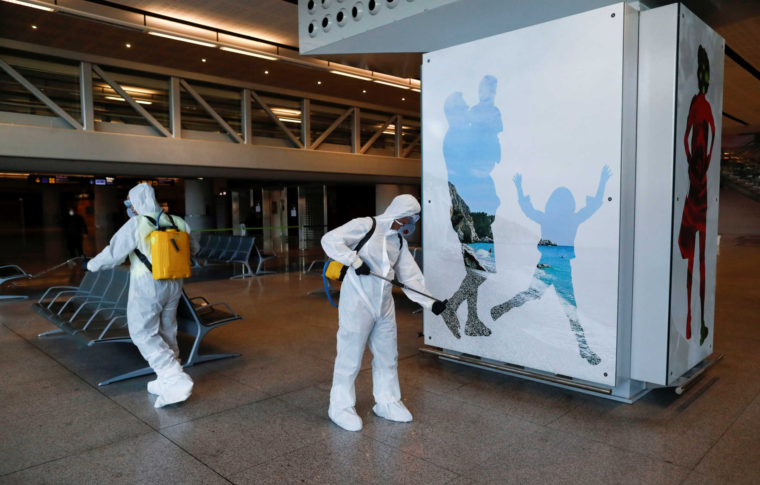 Members of the Military Emergency Unit (UME) disinfect the Malaga-Costa del Sol international airport during a partial lockdown as part of a 15-day state of emergency to combat the coronavirus disease outbreak in Malaga, Spain March 16, 2020. REUTERS