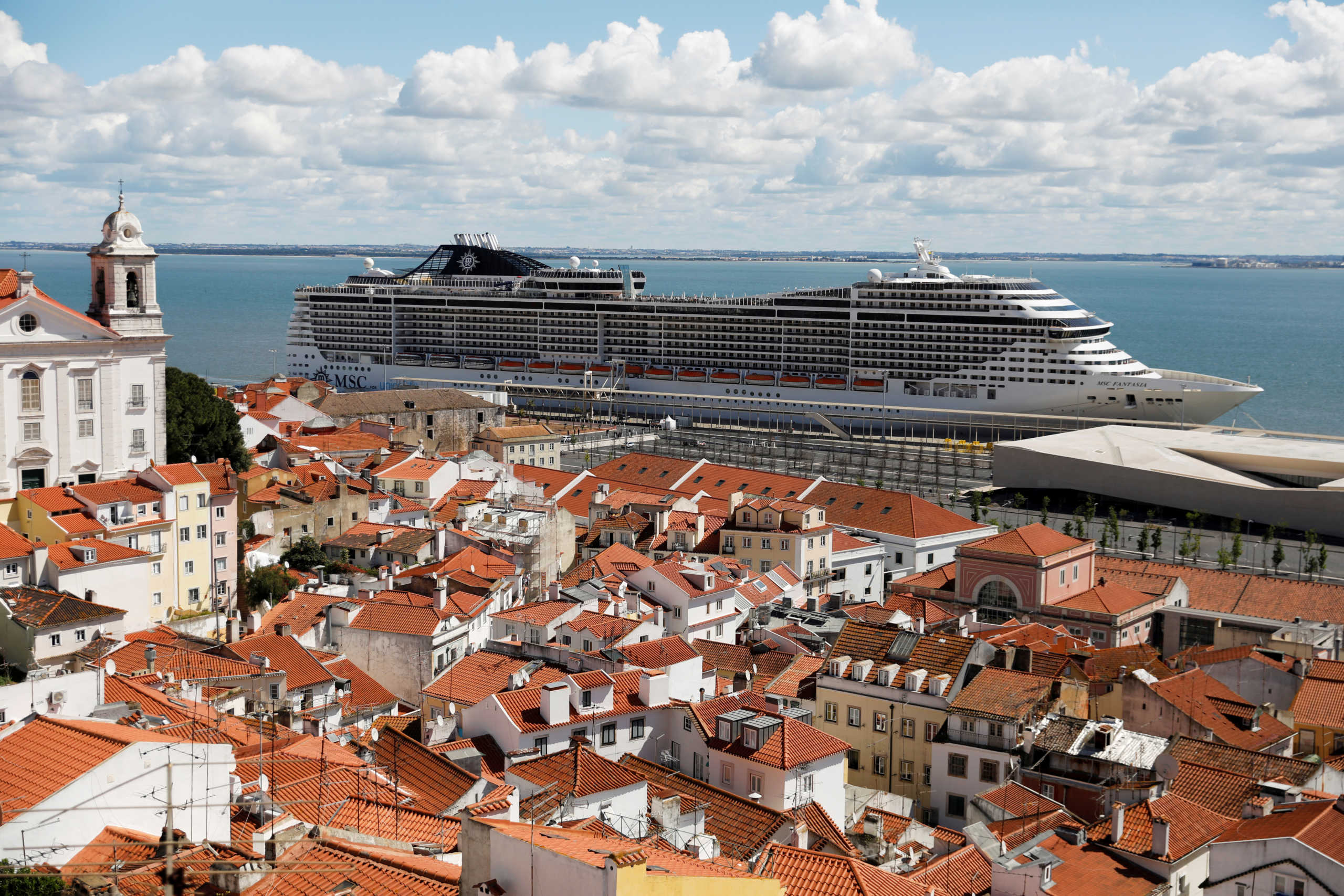 A view of the docked MSC Fantasia cruise ship, where Portuguese authorities began the coronavirus testing and repatriation process for 1,338 passengers, at the port in Lisbon, Portugal March 22, 2020.  REUTERS
