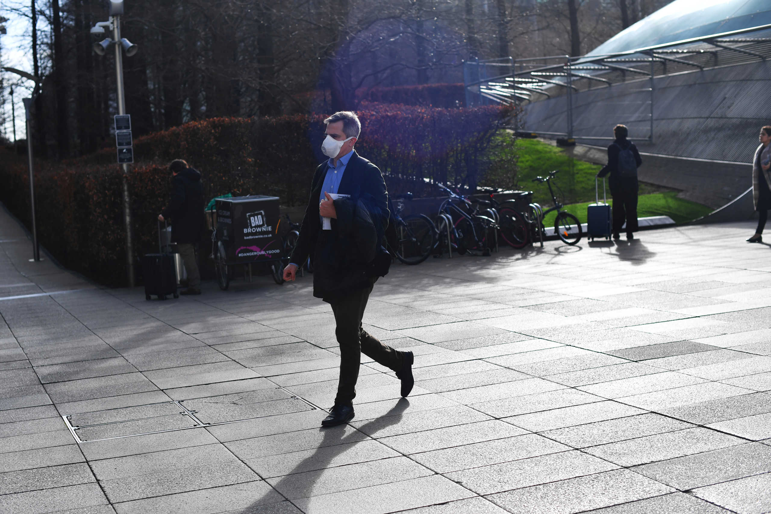 Commuters walk through Canary Wharf, as the number of coronavirus cases grow around the world and as European stocks plunge into bear market territory, in London, Britain March 9, 2020.  REUTERS