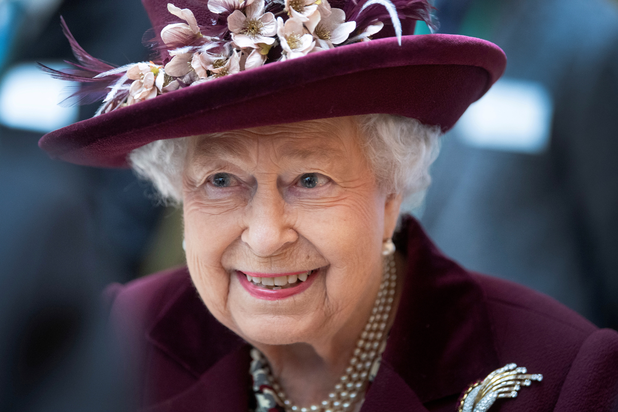 FILE PHOTO: Britain's Queen Elizabeth II talks with MI5 officers during a visit to the headquarters of MI5, which is the United Kingdom's domestic counter-intelligence and security agency, at Thames House in London, Britain February 25, 2020. Victoria Jones