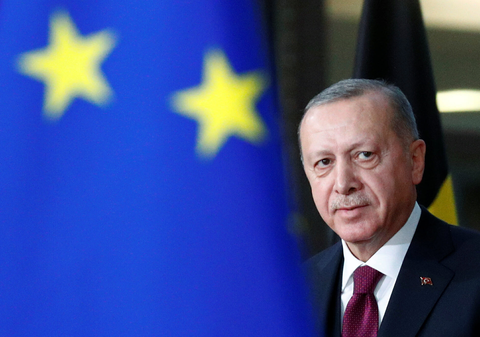 Turkish President Tayyip Erdogan arrives for a meeting with EU Council President Charles Michel in Brussels, Belgium March 9, 2020. REUTERS