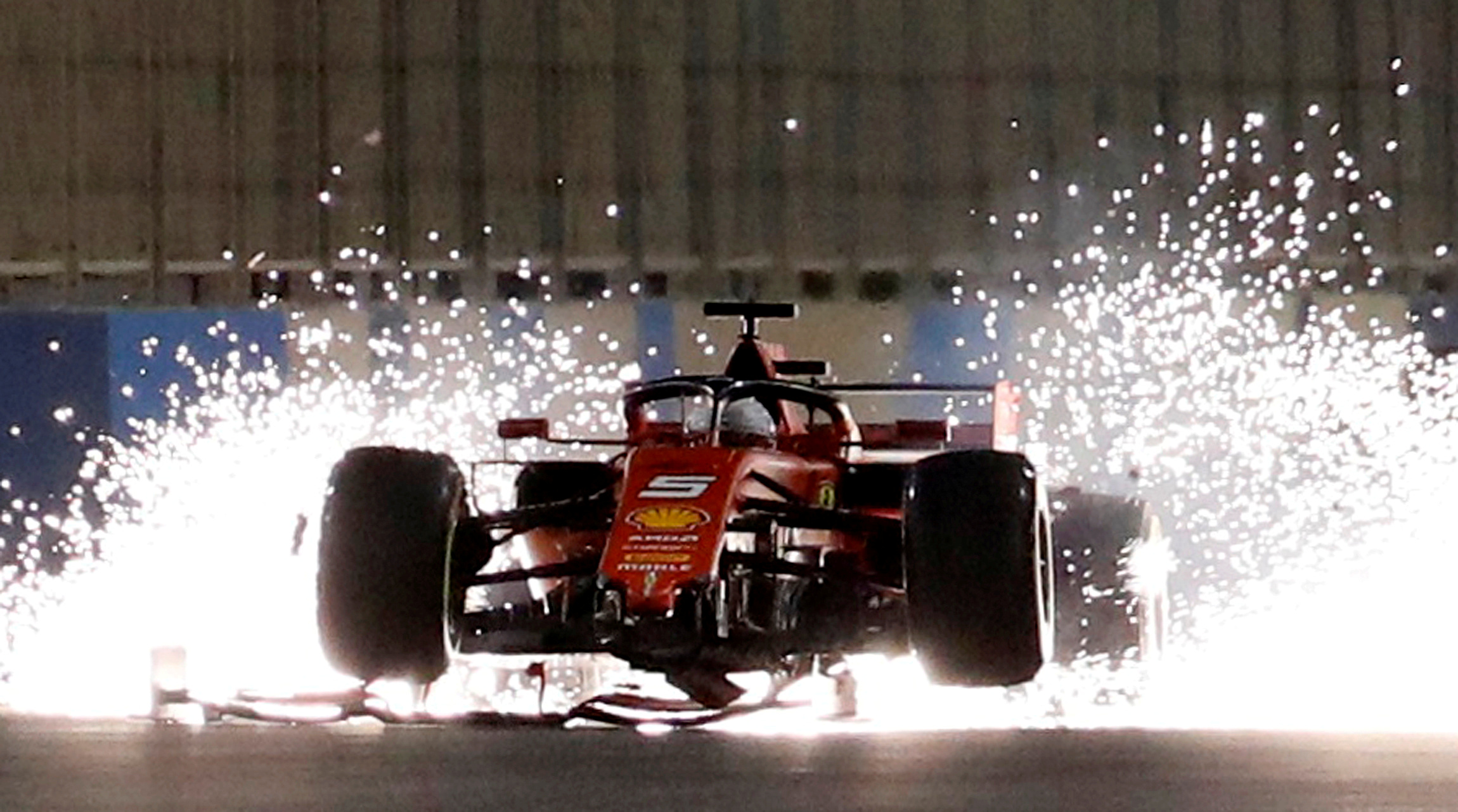 FILE PHOTO: ON THIS DAY -- March 31  March 31, 2019     FORMULA ONE - Ferrari driver Sebastian Vettel's Bahrain Grand Prix unravels in spectacular fashion despite leading the race in the early stages.     After his team mate Charles Leclerc overtook him on the sixth lap and pulled away, Vettel then spun on track at a turn when he was overtaken by Lewis Hamilton a few laps later.     Vettel's car suffered front wing damage and intense vibrations caused the wing to dislodge completely and go under his car on a straight. The German driver eventually finished fifth despite starting on the front row of the grid. REUTERS