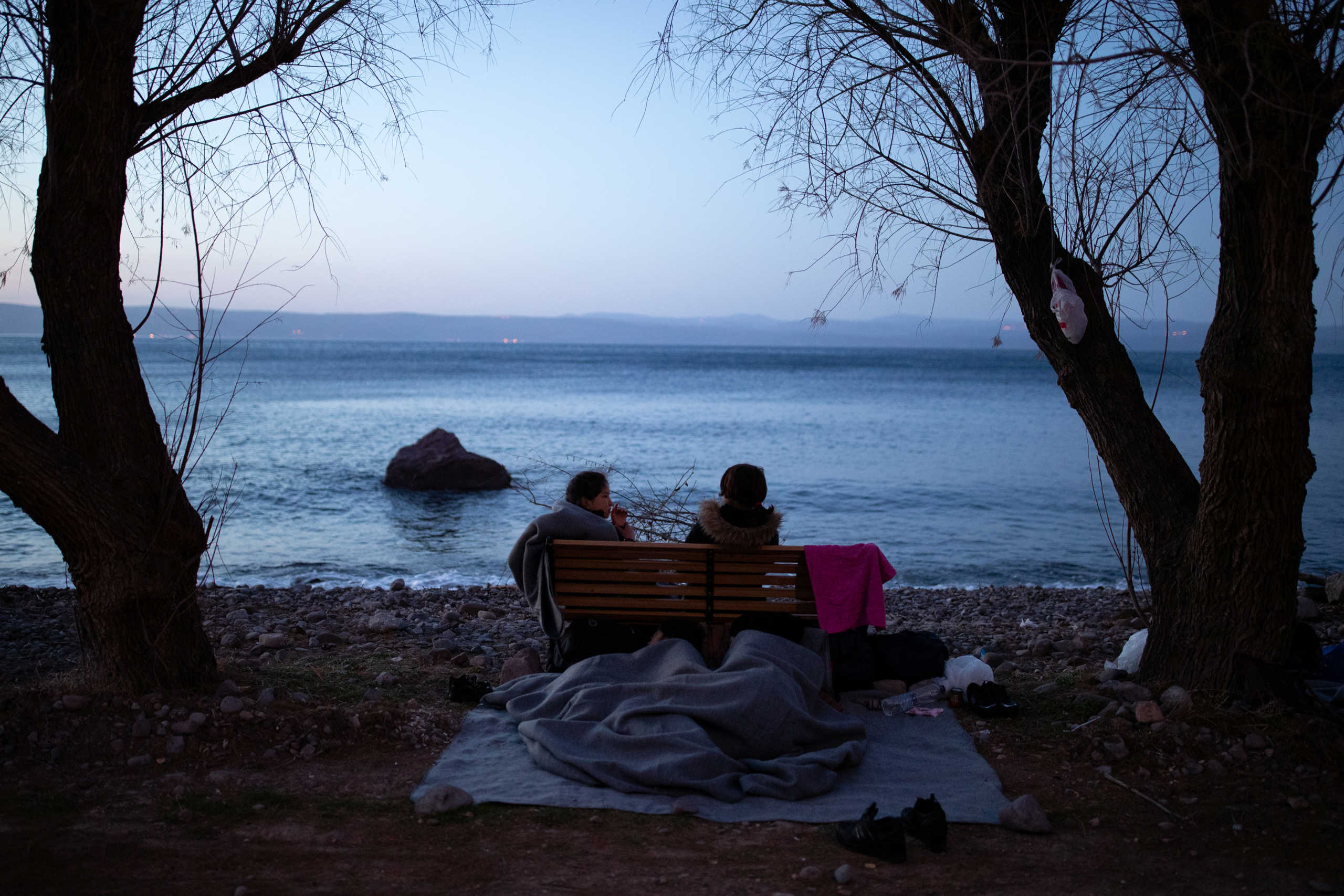 Migrants from Afghanistan that arrived on a dinghy on a beach in the past two days near the village of Skala Sikamias, after crossing part of the Aegean Sea from Turkey to the island of Lesbos, Greece, March 2, 2020. REUTERS