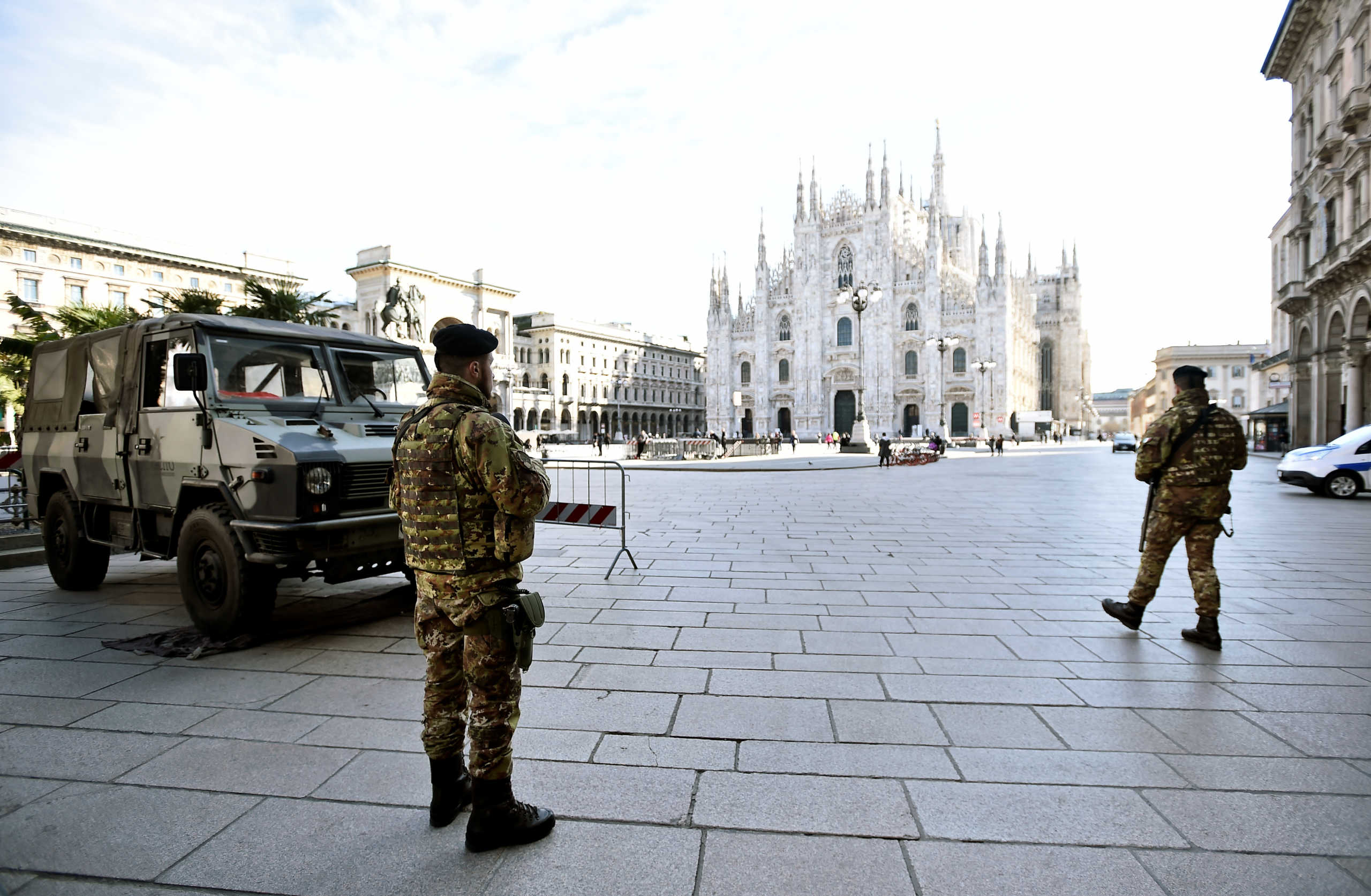 Military are seen on Duomo square after the Italian government imposed a virtual lockdown on the north of the country, in Milan, Italy March 8, 2020. REUTERS