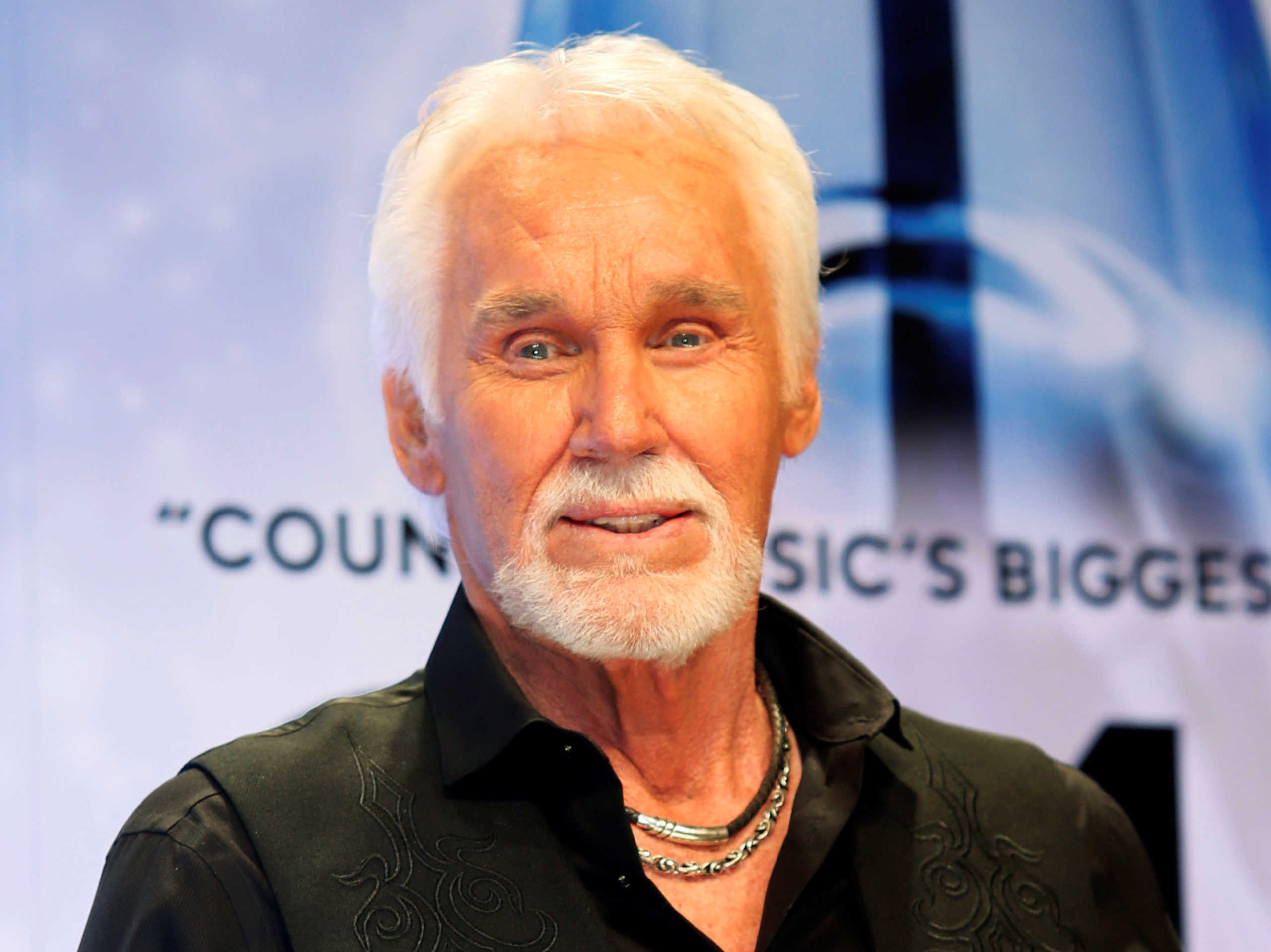 FILE PHOTO: Kenny Rogers poses backstage after accepting the Willie Nelson Lifetime Achievement award at the 47th Country Music Association Awards in Nashville, Tennessee, U.S., November 6, 2013.     REUTERS