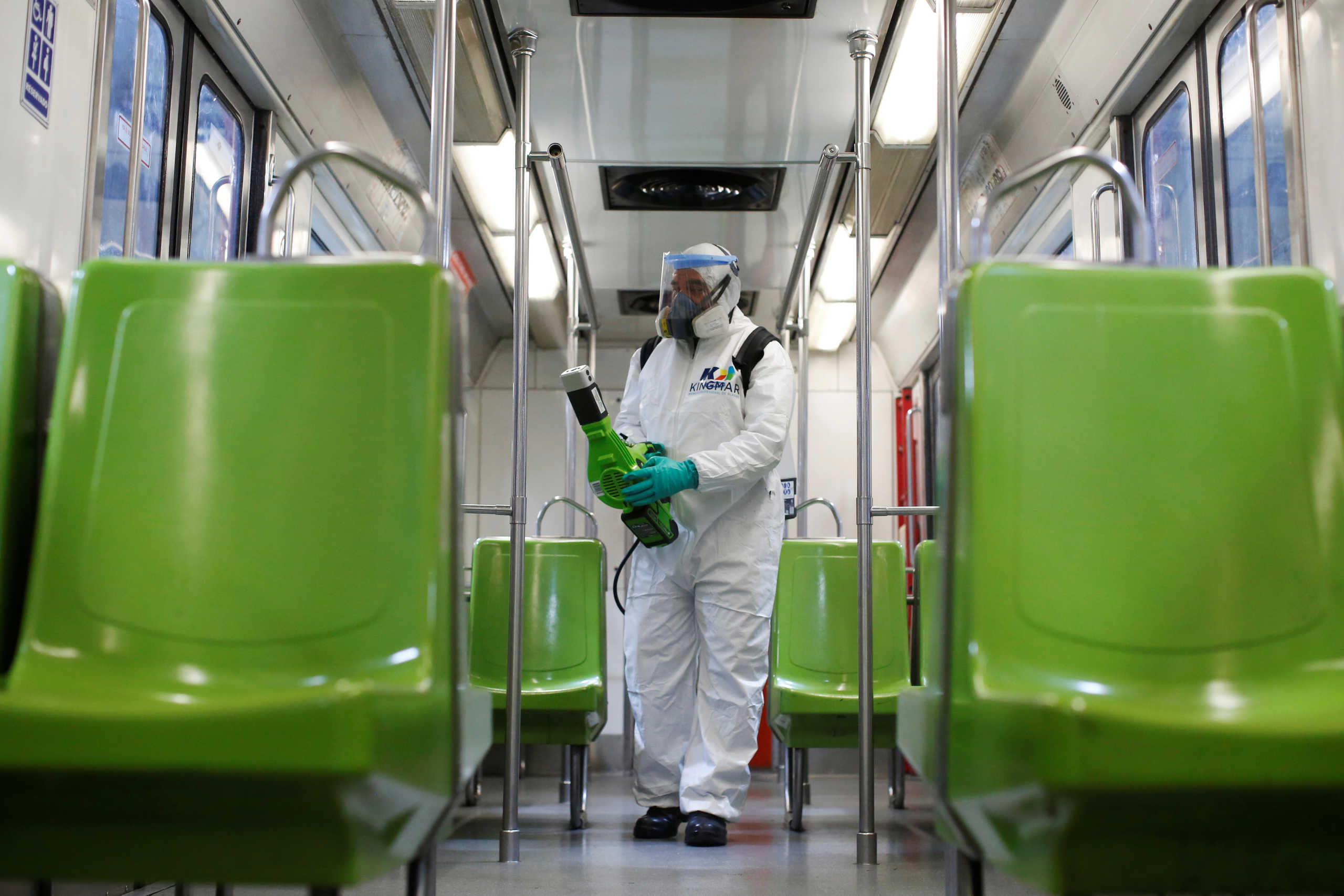 A worker carries out the disinfection of a metro car, as part of Mexico City's government's measures in response to the coronavirus disease (COVID-19), in Mexico City, Mexico March 17, 2020. REUTERS