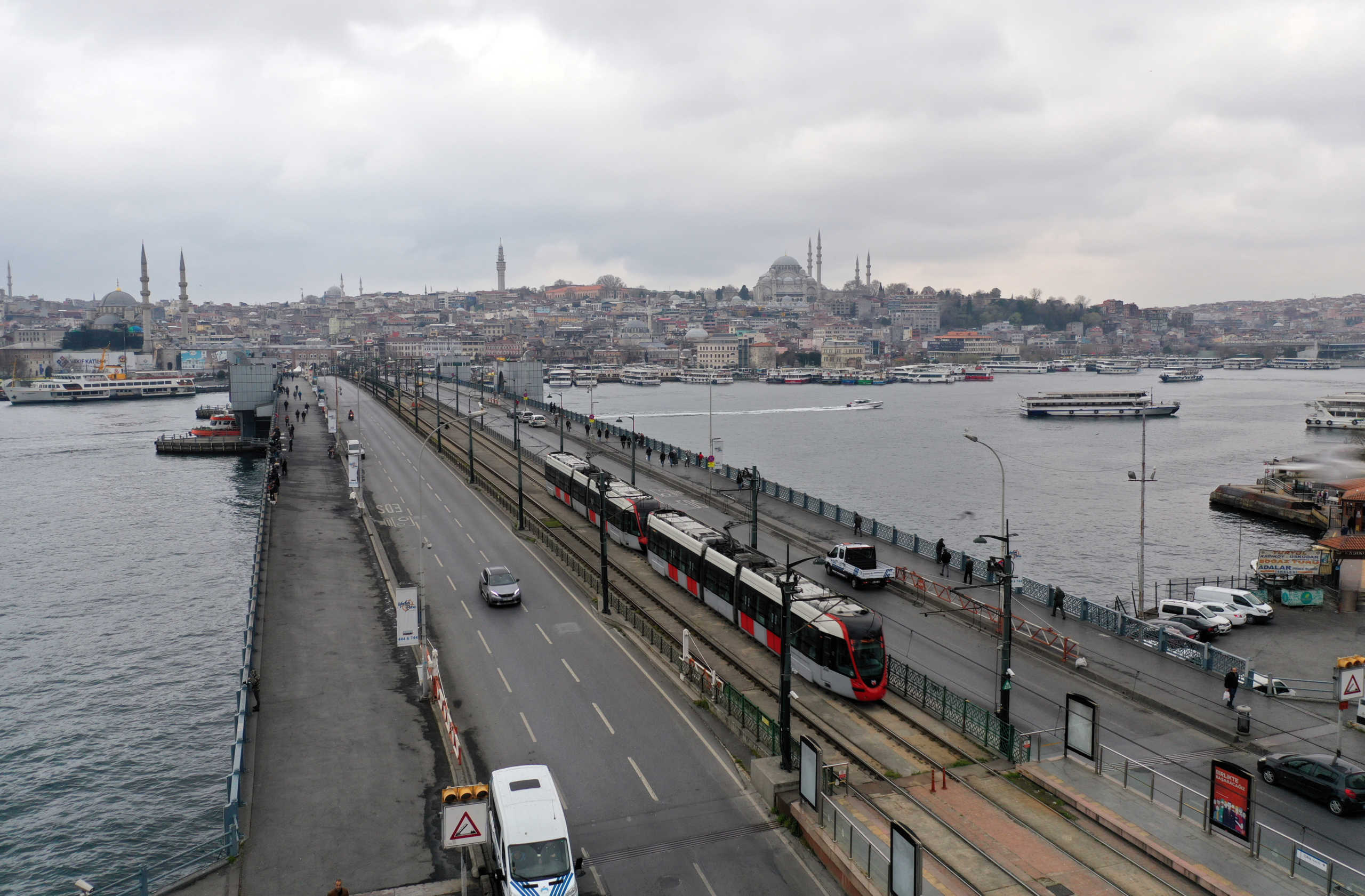 An aerial view shows an usually busy Galata bridge during the outbreak of coronavirus disease (COVID-19), in Istanbul, Turkey, March 23, 2020. Picture taken with a drone. REUTERS