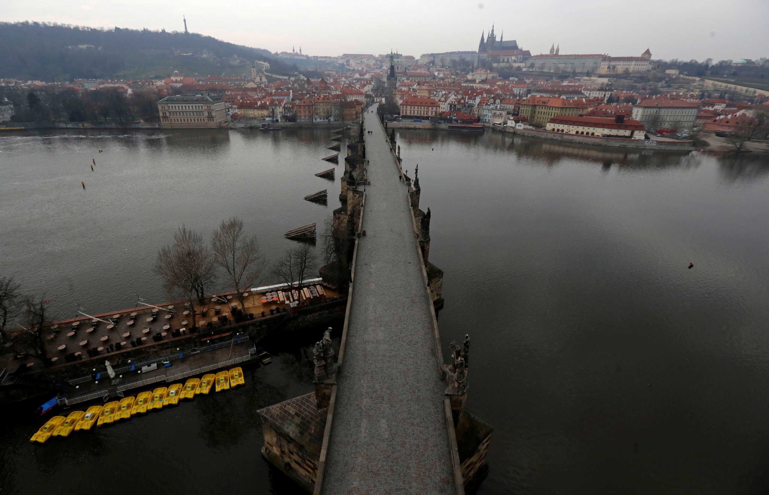 An empty medieval Charles Bridge is seen in Prague, following the outbreak of coronavirus disease (COVID-19), Czech Republic, March 20, 2020.  REUTERS