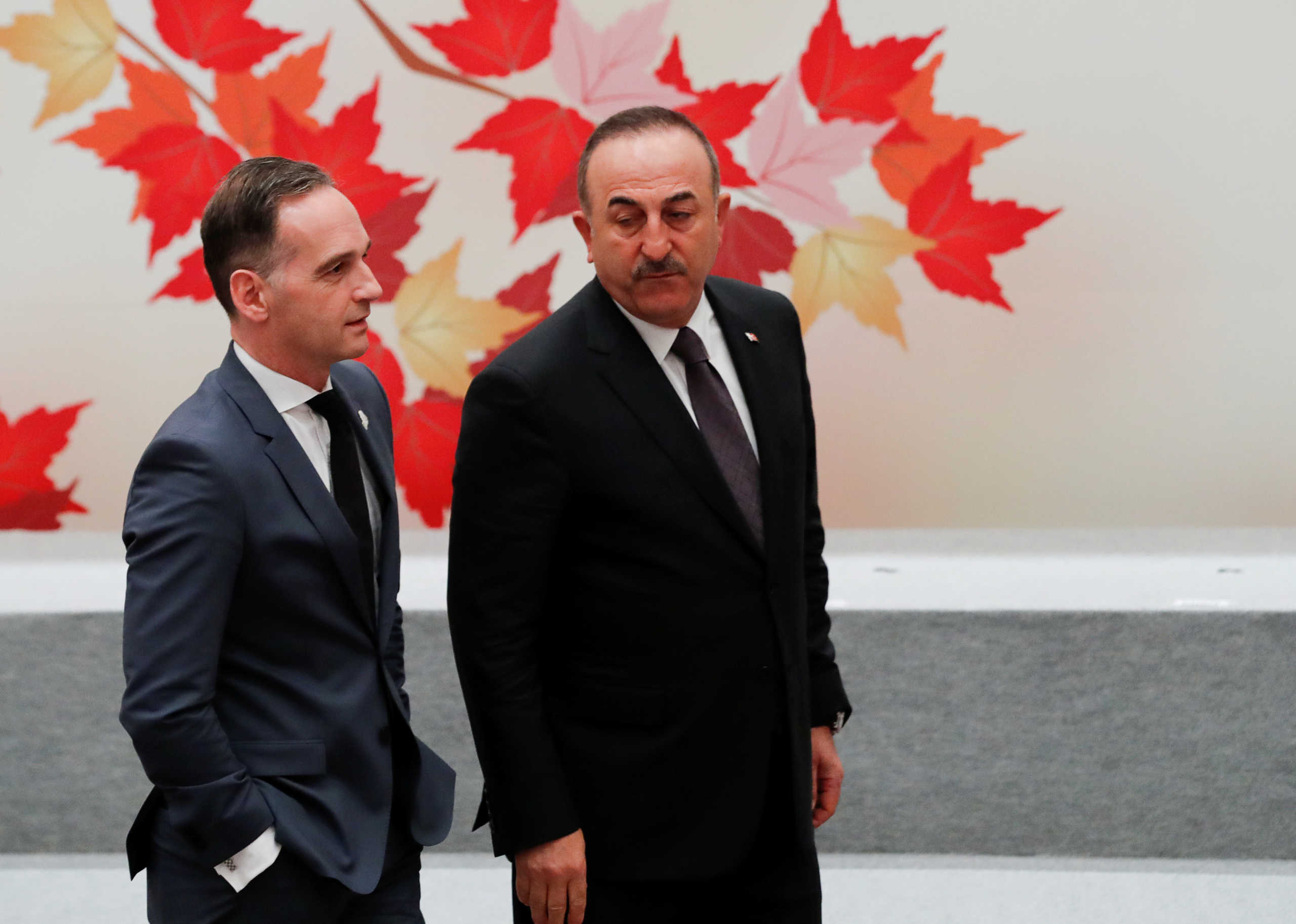 Turkey’s Foreign Minister Mevlut Cavusoglu talks to Germany’s Foreign Minister Heiko Maas during a family photo session at the G20 Foreign Ministers' Meeting in Nagoya, Japan, November 23, 2019. REUTERS