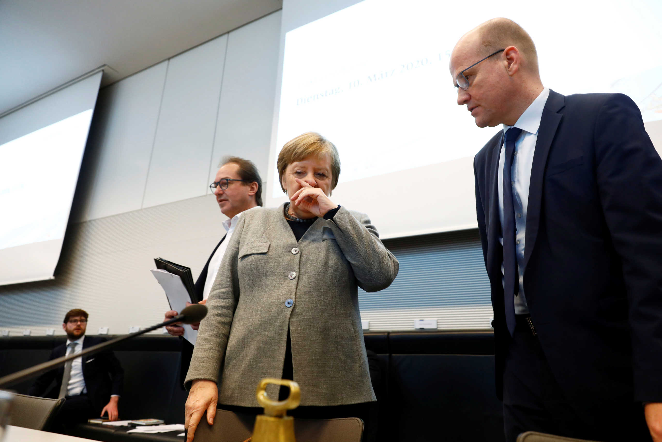 Christian Social Union (CSU) leader Alexander Dobrind, German Chancellor Angela Merkel and Christian Democratic Union (CDU) leader Ralph Brinkhaus arrive for a CDU meeting, in Berlin, Germany March 10, 2020.    REUTERS