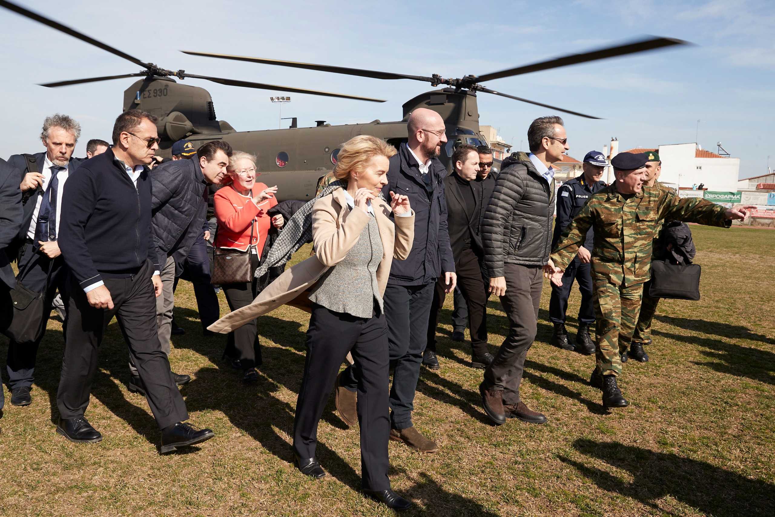 Greek Prime Minister Kyriakos Mitsotakis, European Commission President Ursula von der Leyen, European Council President Charles Michel and European Parliament President David-Maria Sassoli (not pictured) disembark a Chinook helicopter after flying over the Greek-Turkish border, in the region of Evros, Greece, March 3, 2020. Greek Prime Minister's Office