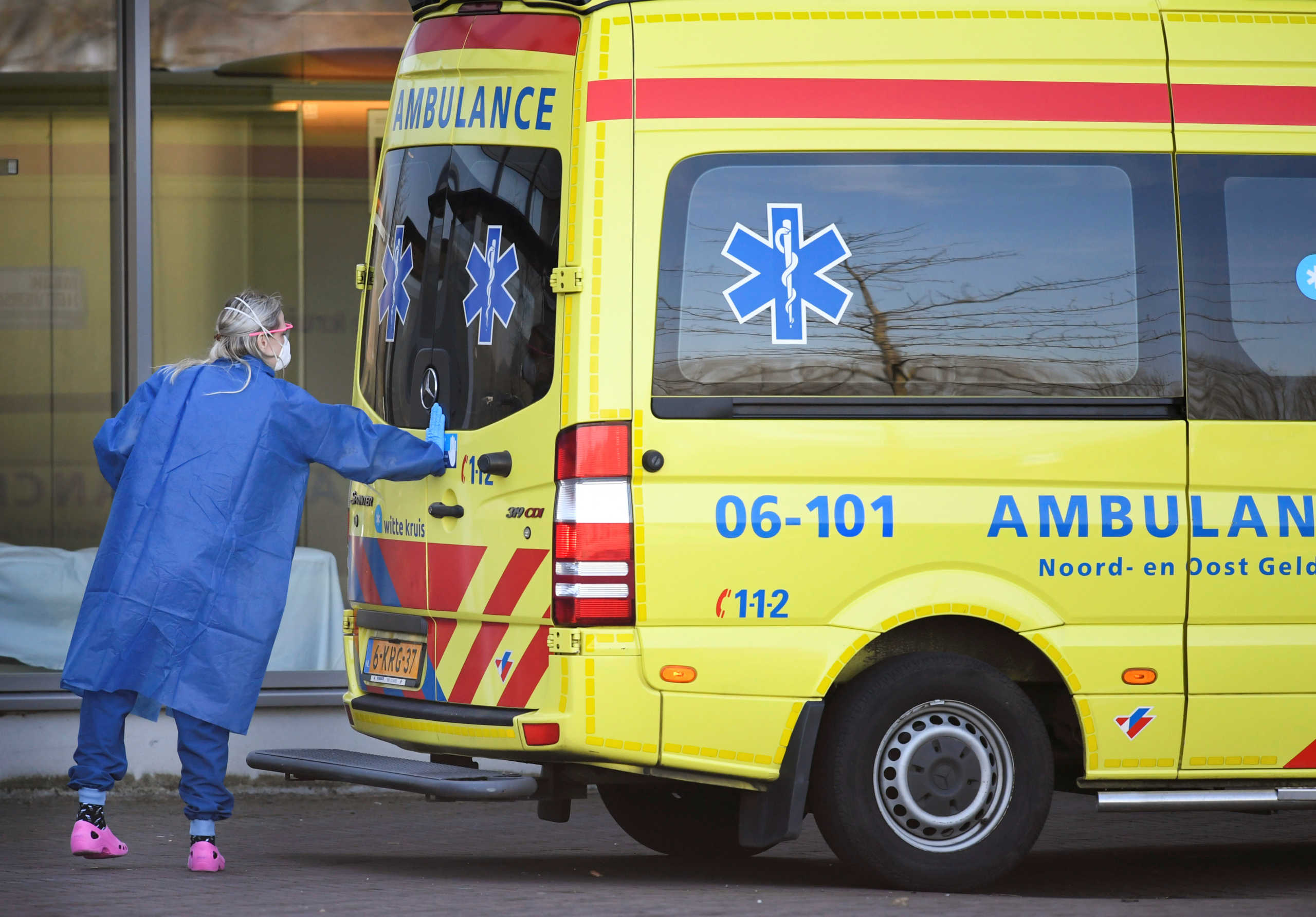 An ambulance van with a patient leaves Bernhoven hospital, as the spread of coronavirus disease (COVID-19) continues, in Uden, Netherlands, March 25, 2020. REUTERS