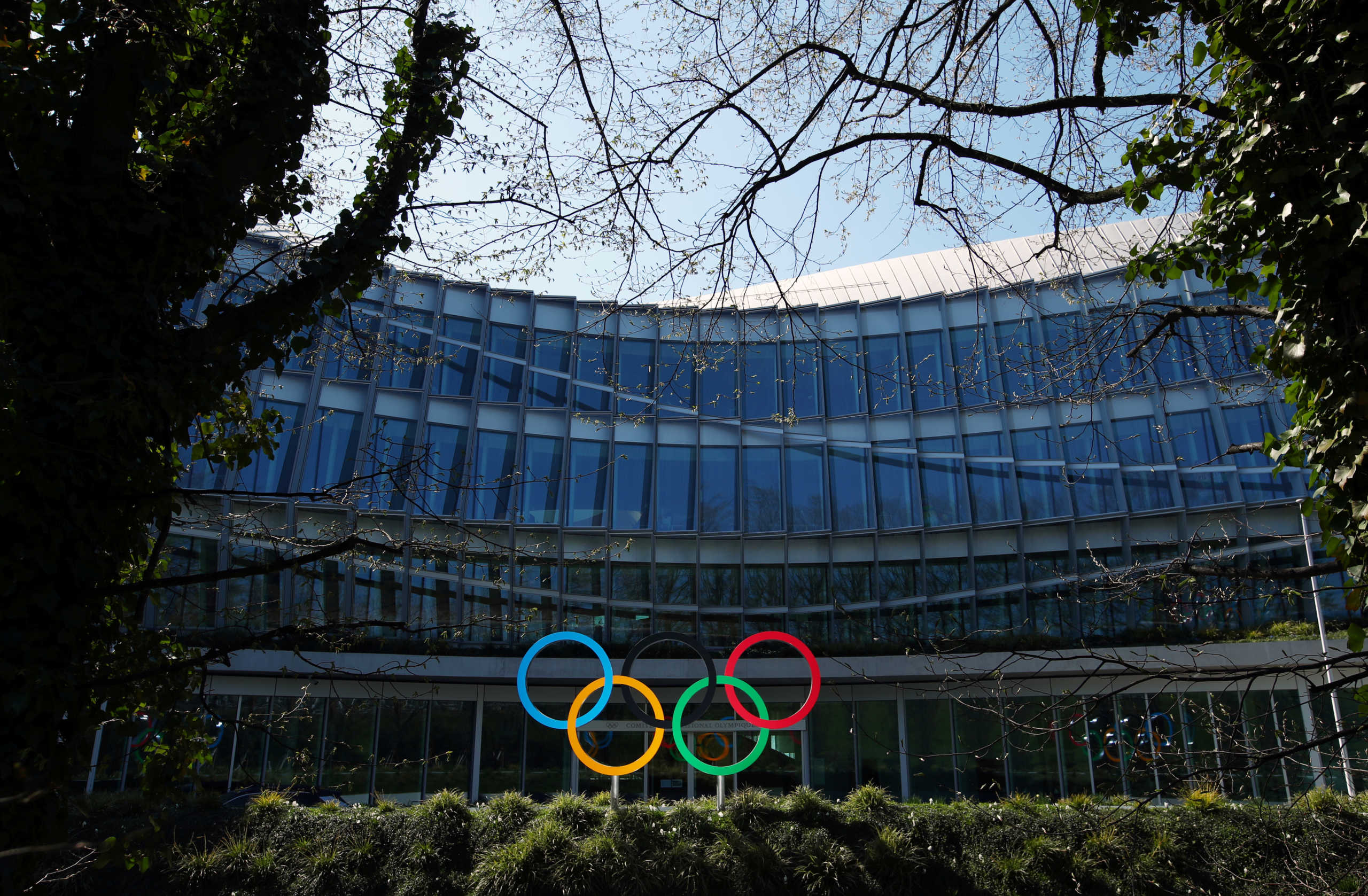 The Olympic rings are pictured in front of the International Olympic Committee (IOC) during the coronavirus disease (COVID-19) outbreak in Lausanne, Switzerland, March 24, 2020. REUTERS