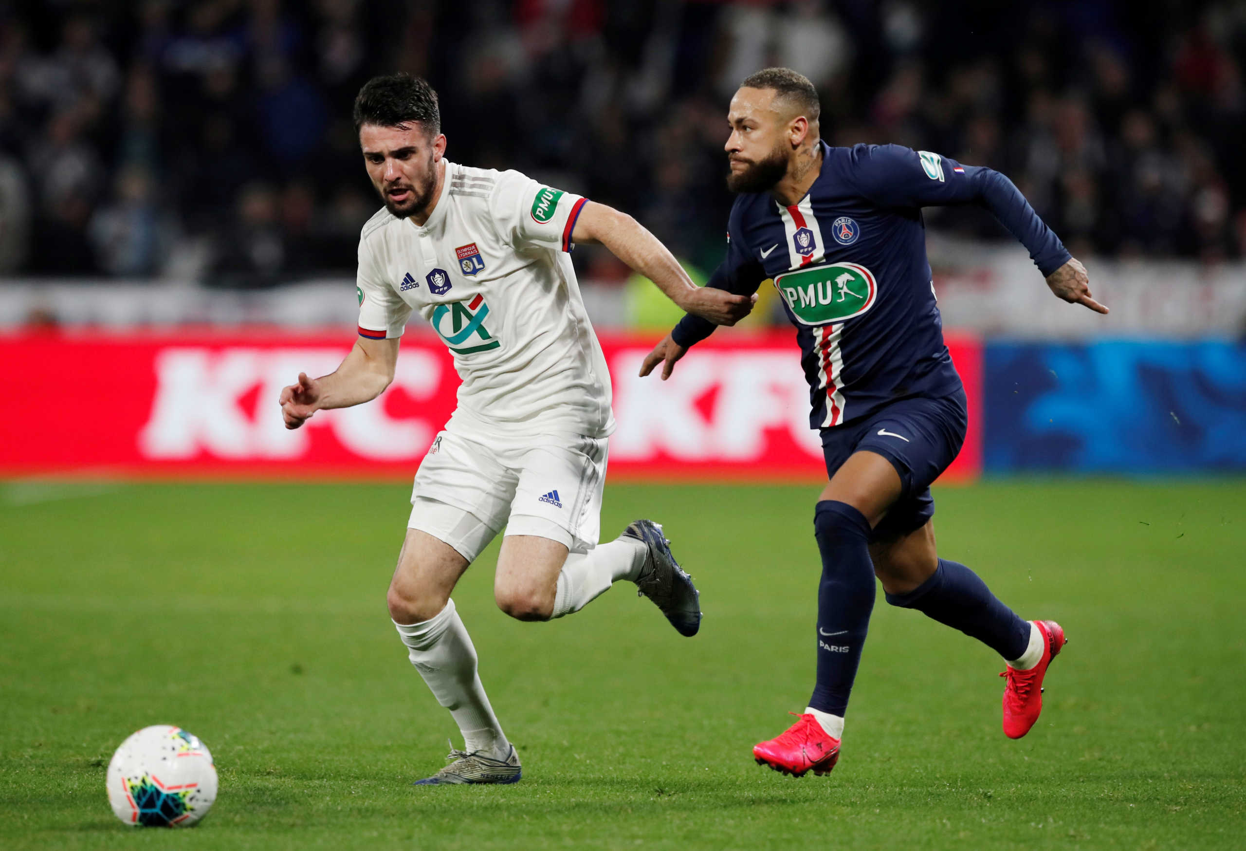 Soccer Football - Coupe de France - Semi Final - Olympique Lyonnais v Paris St Germain - Groupama Stadium, Lyon, France - March 4, 2020  Olympique Lyonnais' Leo Dubois in action with Paris St Germain's Neymar   REUTERS