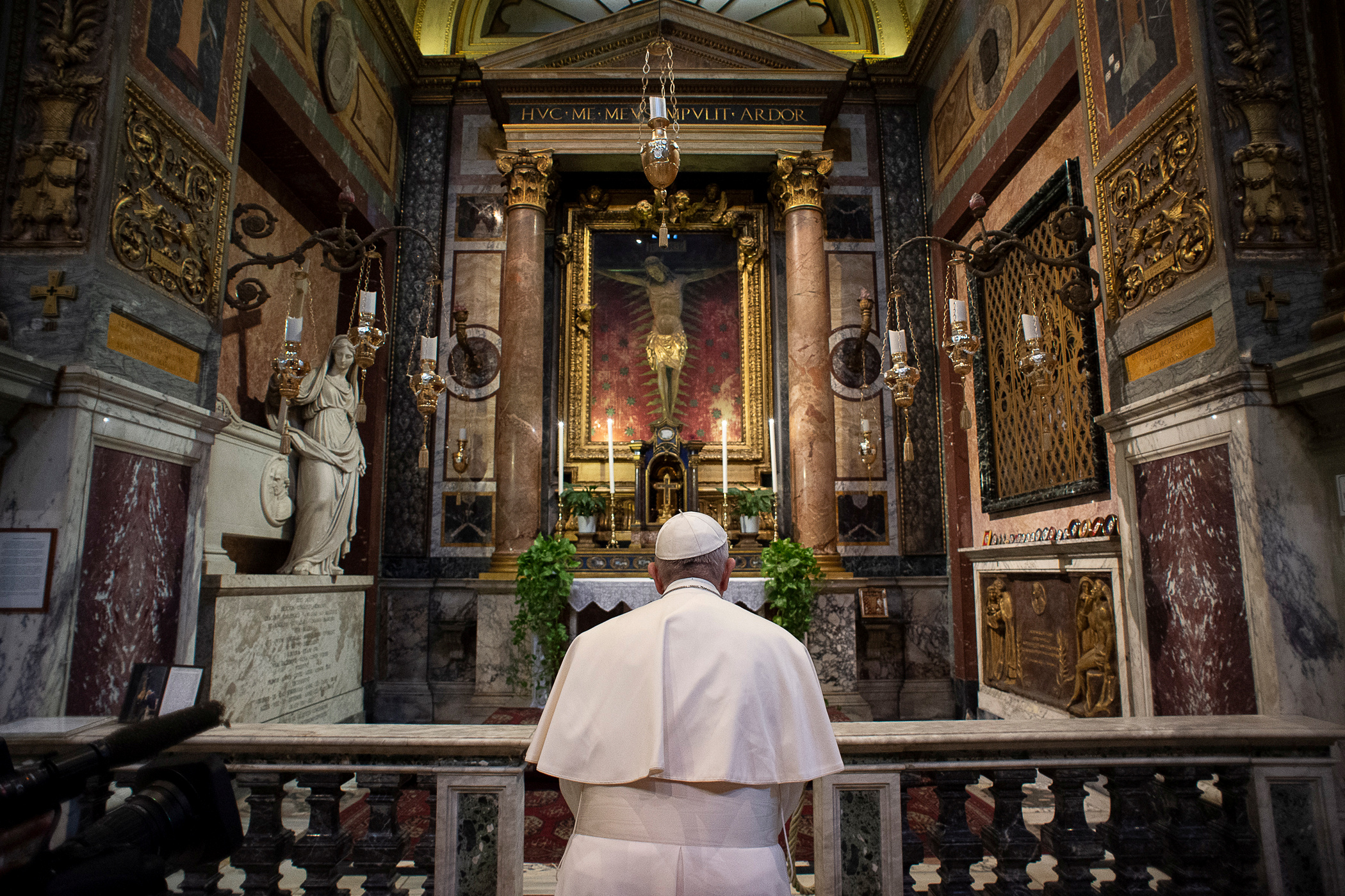 Pope Francis prays at San Marcello al Corso church for the end of the coronavirus pandemic, in Rome, Italy March 15, 2020. Vatican Media