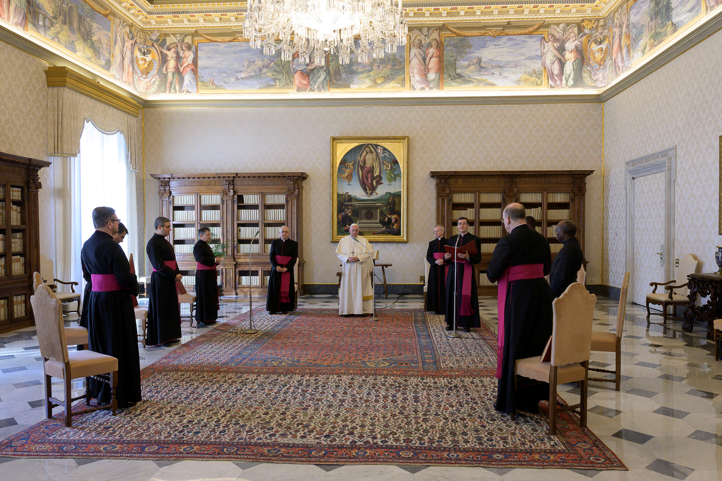 Pope Francis holds the general audience as it is streamed via video over the internet from a library inside the Vatican, March 25, 2020. Vatican Media