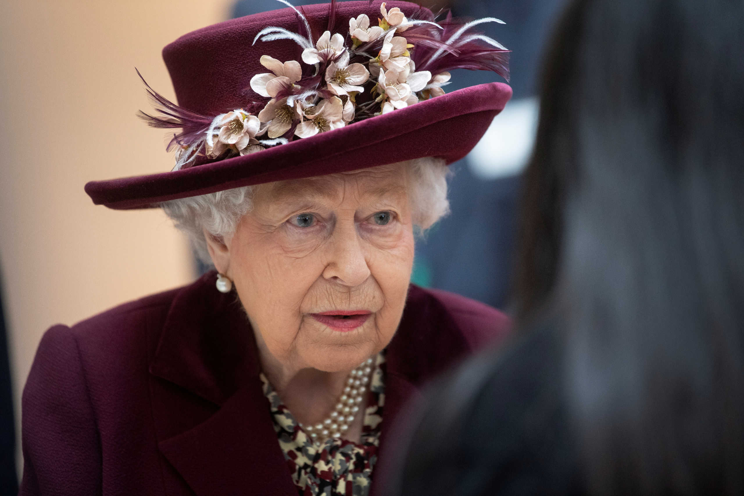 Britain's Queen Elizabeth II talks with MI5 officers during a visit to the headquarters of MI5, which is the United Kingdom's domestic counter-intelligence and security agency, at Thames House in London, Britain February 25, 2020. Victoria Jones