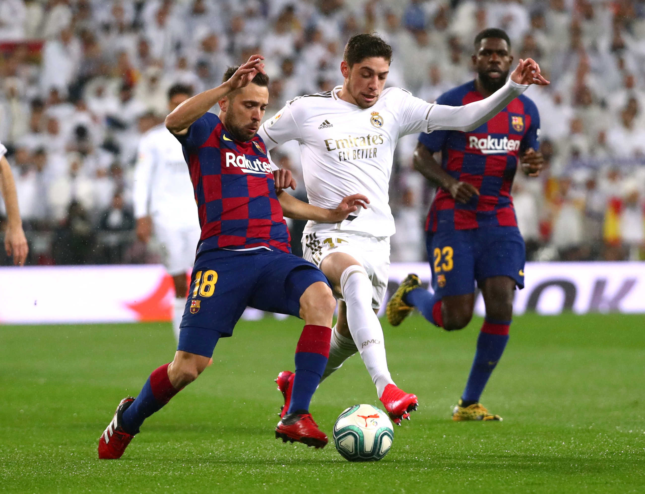 Soccer Football - La Liga Santander - Real Madrid v Barcelona - Santiago Bernabeu, Madrid, Spain - March 1, 2020  Barcelona's Jordi Alba in action with Real Madrid's Federico Valverde   REUTERS
