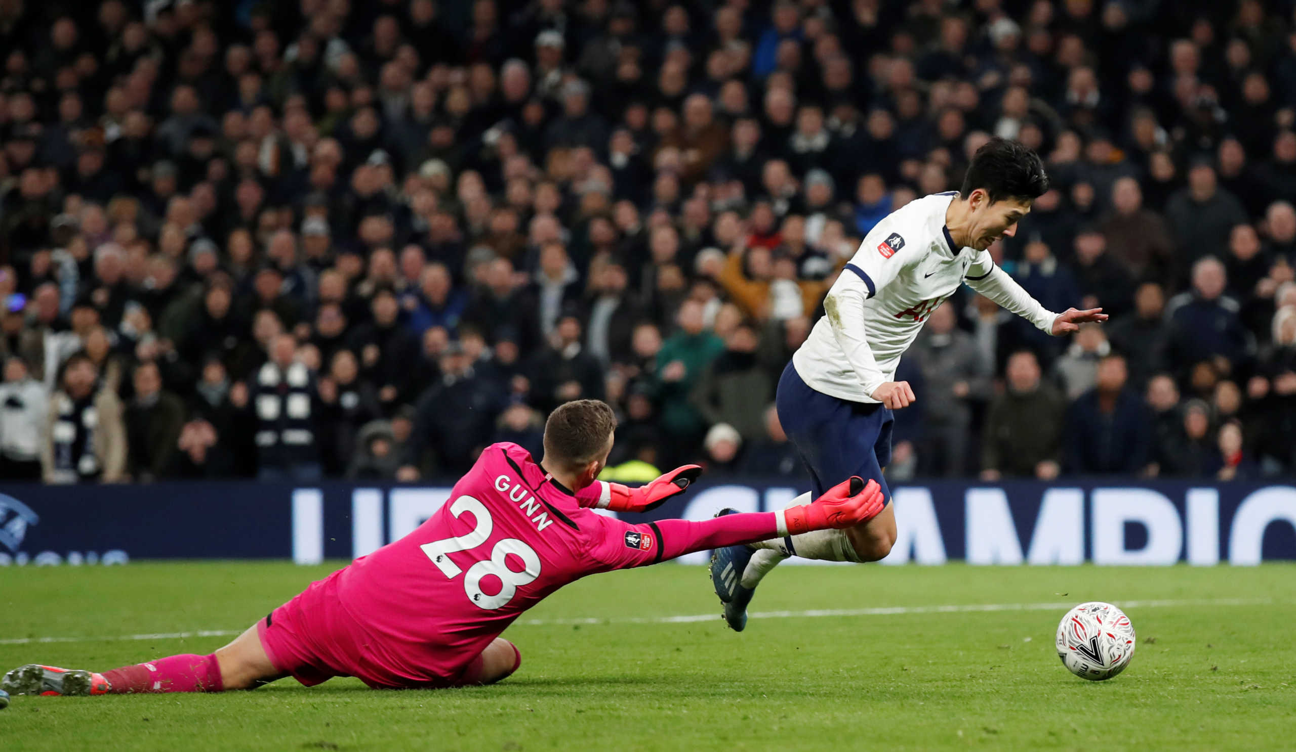 Soccer Football -  FA Cup Fourth Round Replay - Tottenham Hotspur v Southampton  - Tottenham Hotspur Stadium, London, Britain - February 5, 2020   Tottenham Hotspur's Son Heung-min is fouled by Southampton's Angus Gunn resulting in a penalty                         REUTERS