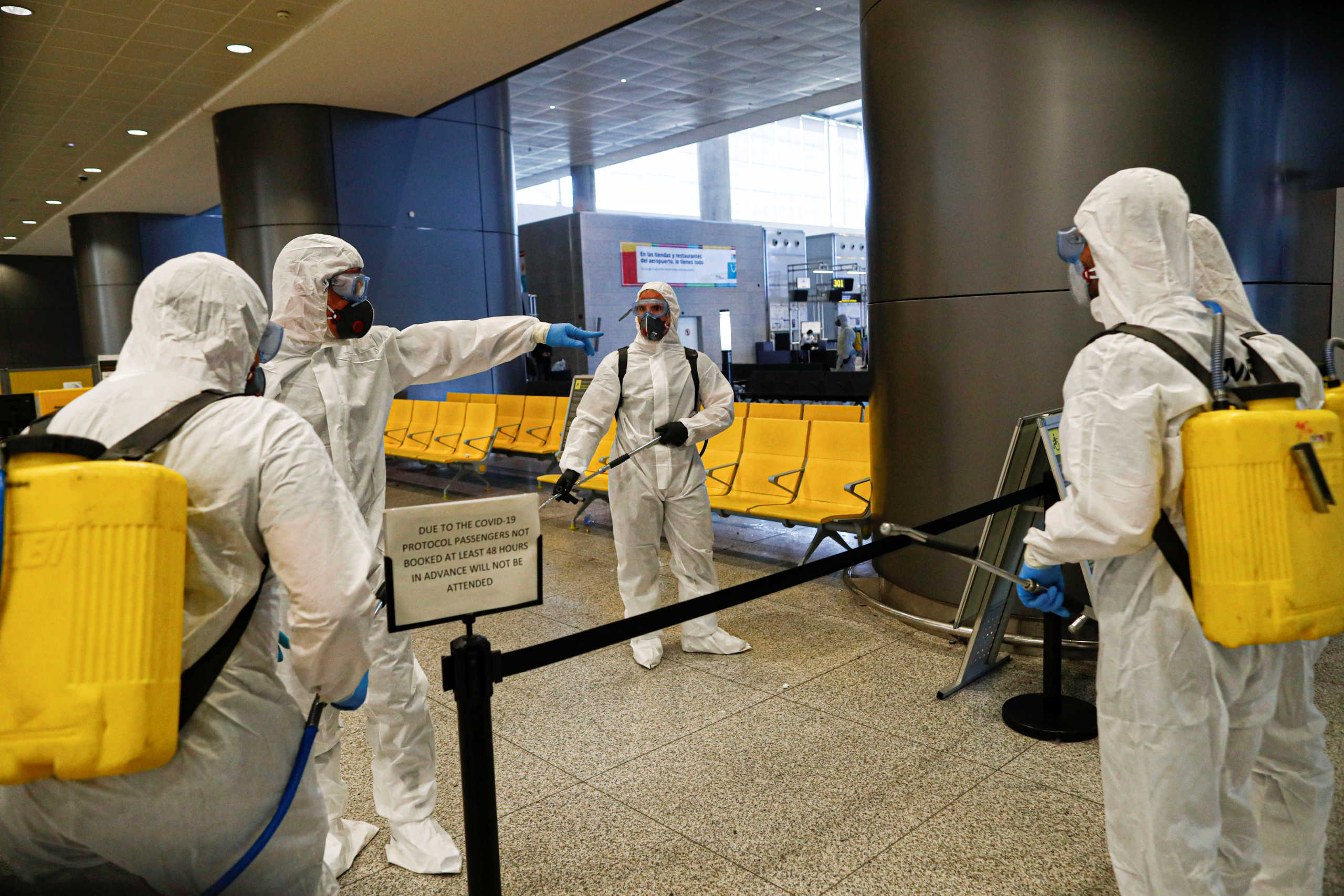 Members of the Military Emergency Unit (UME) disinfect the Malaga-Costa del Sol international airport during a partial lockdown as part of a 15-day state of emergency to combat the coronavirus disease outbreak in Malaga, Spain March 16, 2020. REUTERS