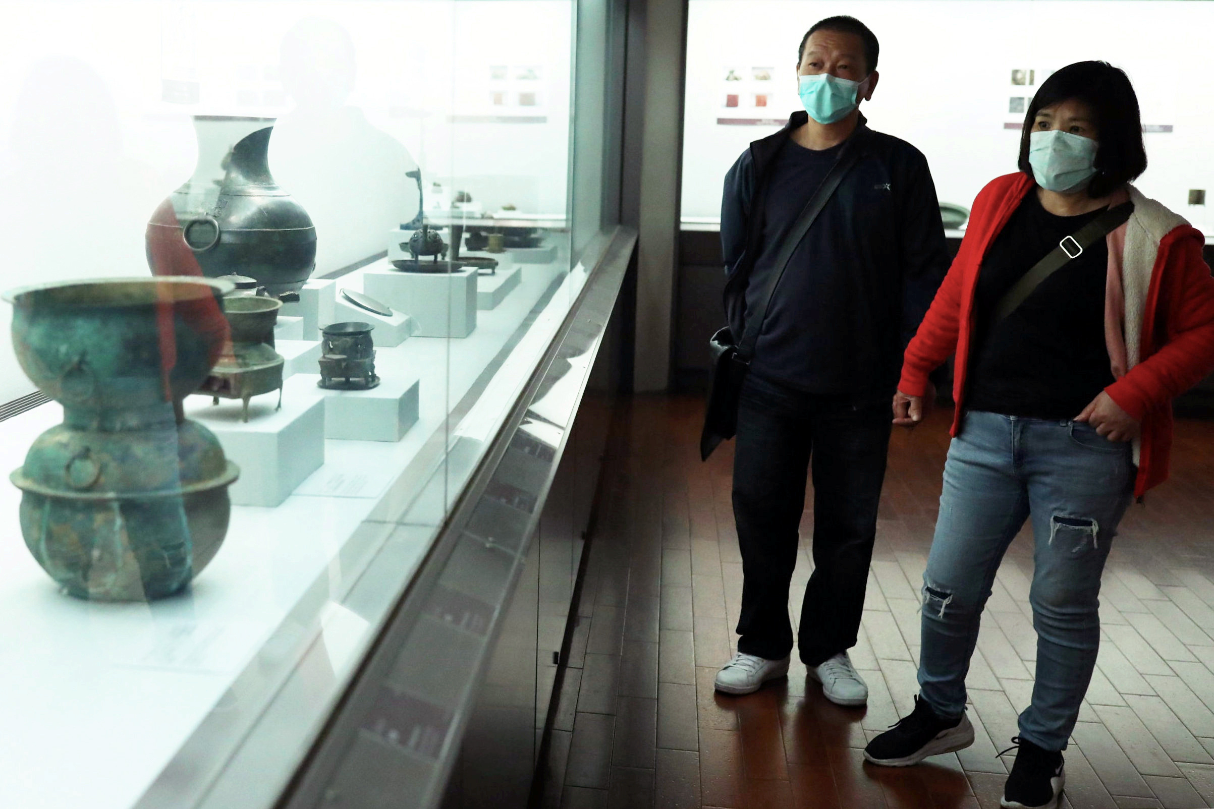 Visitors wear face masks to protect themselves from the coronavirus disease (COVID-19) at the National Palace Museum in Taipei, Taiwan, March 17, 2020. REUTERS