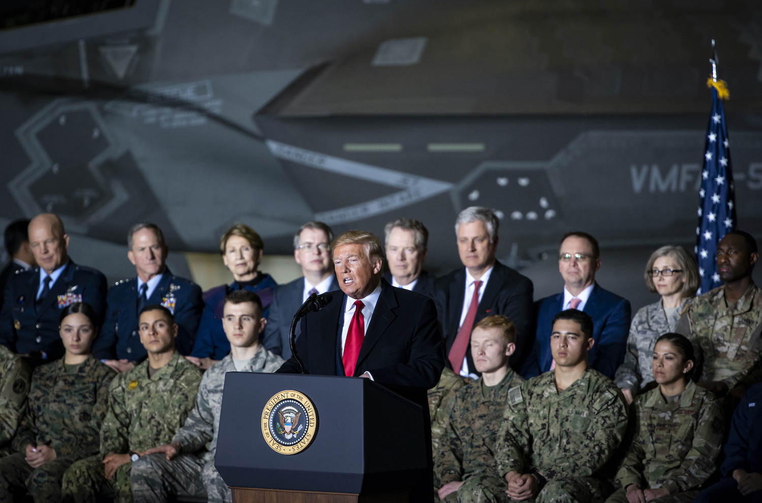 U.S. President Donald Trump speaks during a signing ceremony at Joint Base Andrews, Maryland, U.S., on Friday, Dec. 20, 2019. Trump signed the $738 billion National Defense Authorization Act (NDAA) bill, notably creating the new Space Force in exchange for implementing a 12-week paid parental leave for federal workers. Photographer: Al Drago