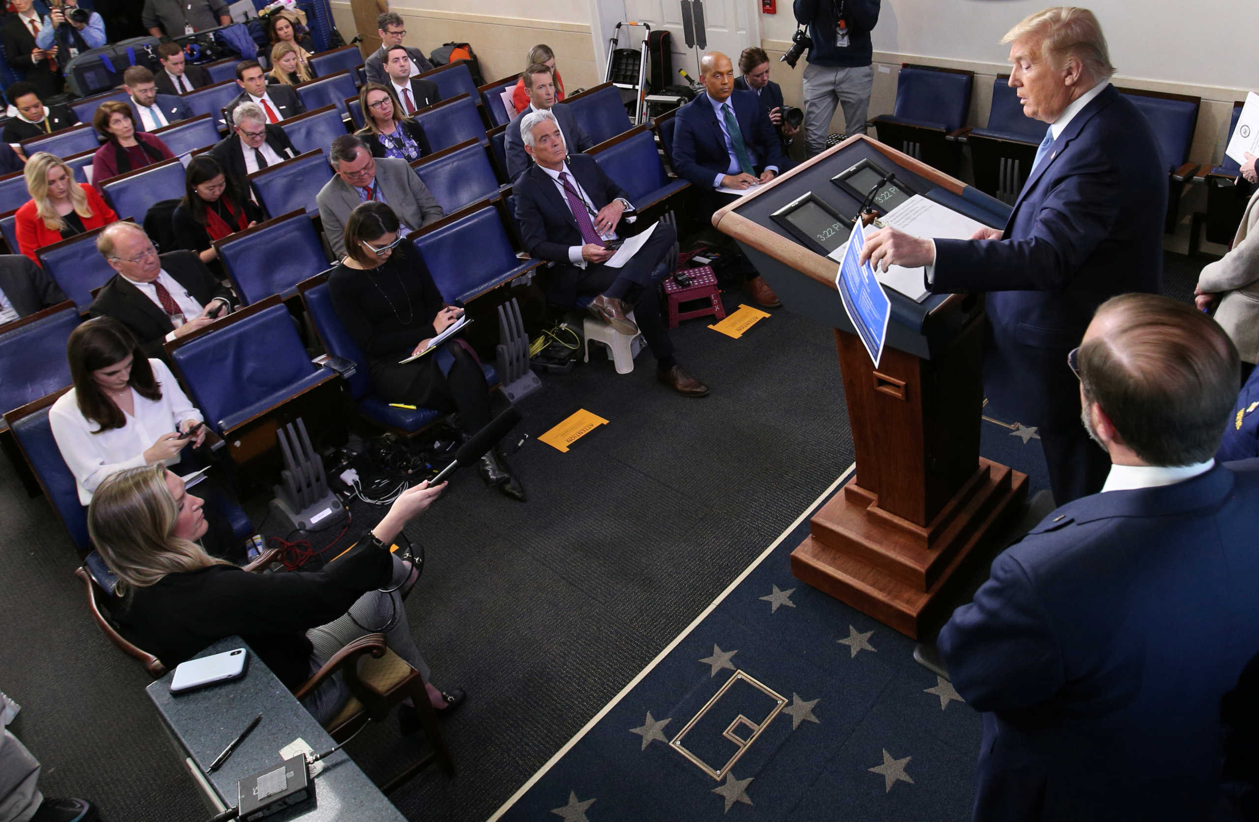 U.S. President Donald Trump is accompanied by members of the coronavirus task force as he addresses a news briefing on the COVID-19 pandemic at the White House in Washington, U.S., March 16, 2020. REUTERS