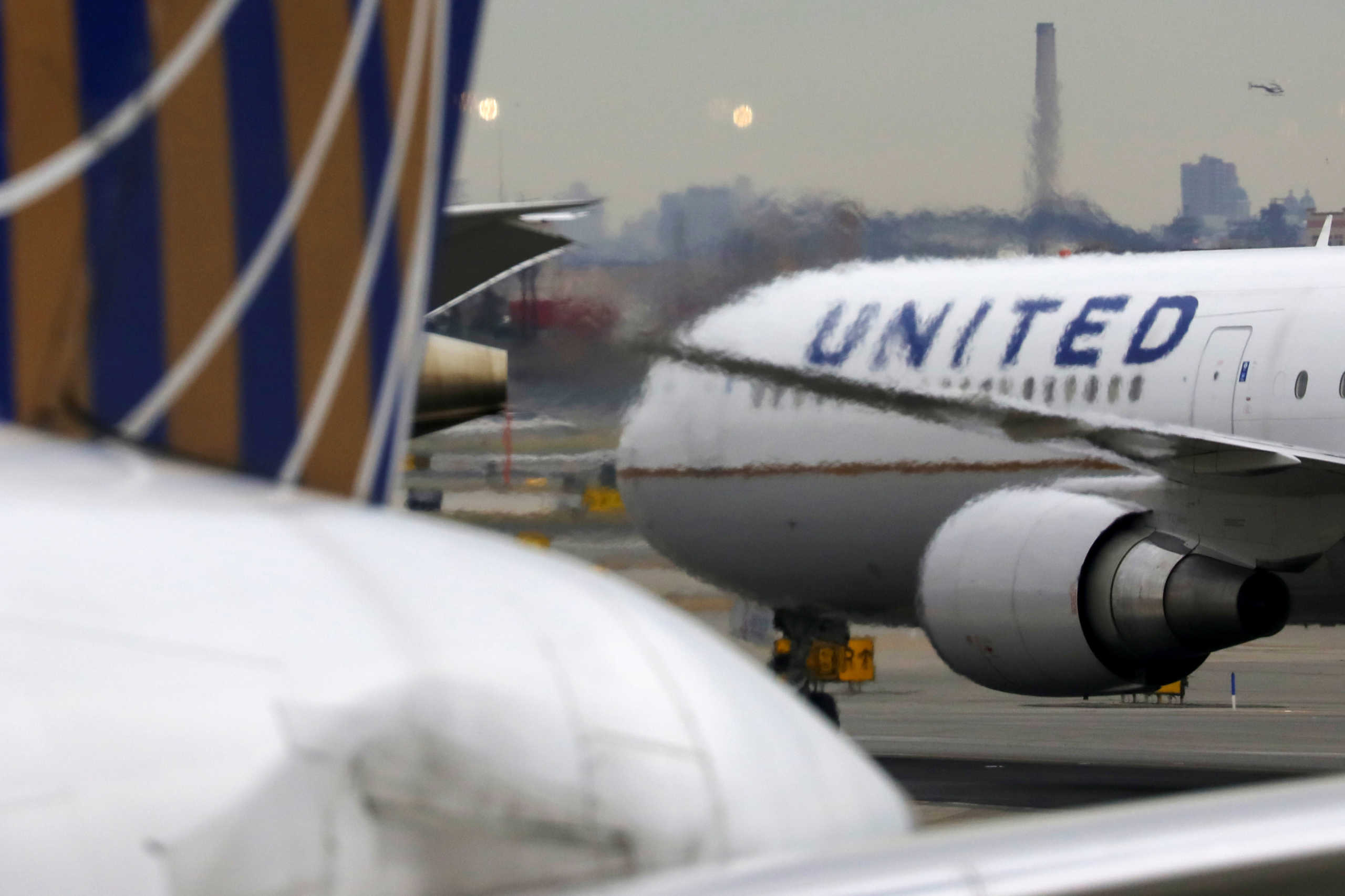 FILE PHOTO: A United Airlines passenger jet taxis at Newark Liberty International Airport, New Jersey, U.S. December 6, 2019. REUTERS