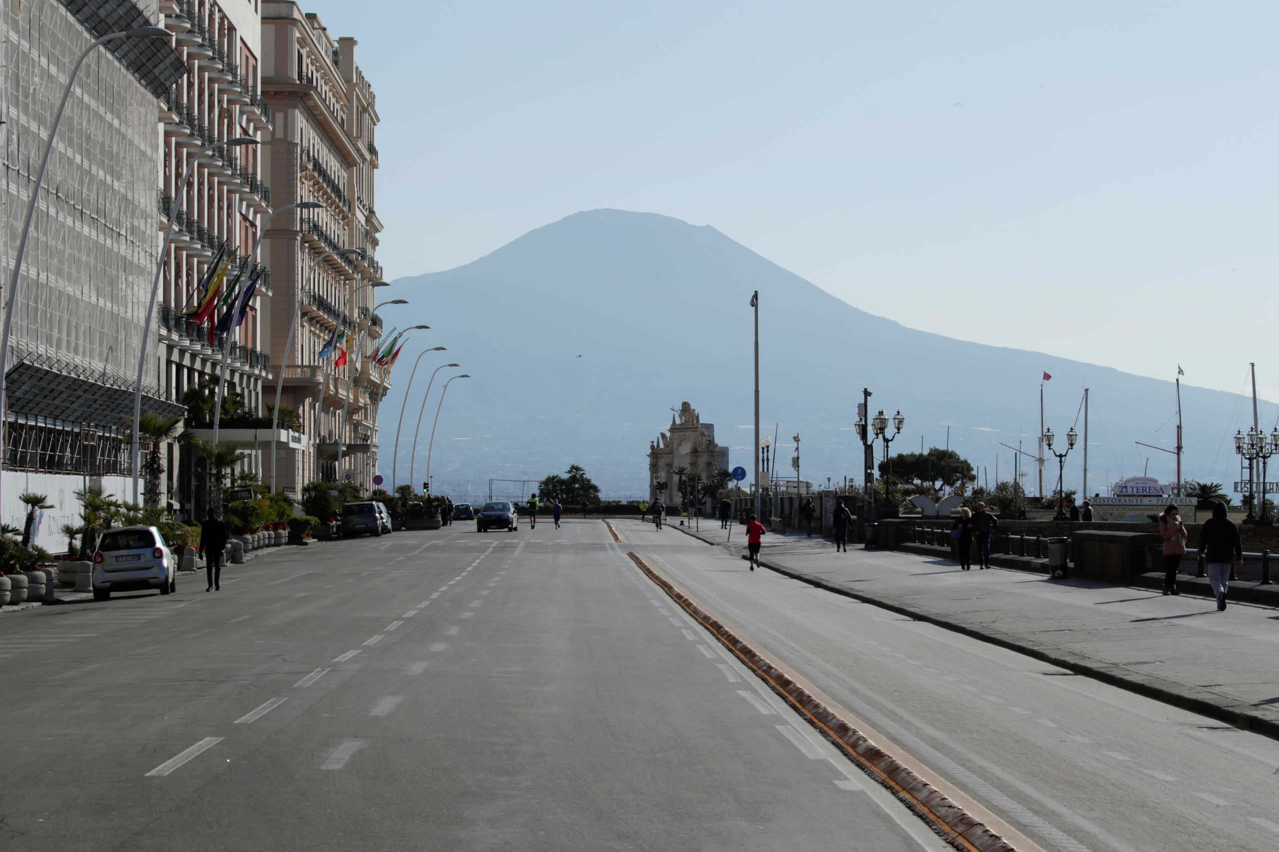 An almost empty Via Partenope is pictured, after a decree orders for the whole of Italy to be on lockdown in an unprecedented clampdown aimed at beating the coronavirus, in Naples, Italy, March 10, 2020. REUTERS