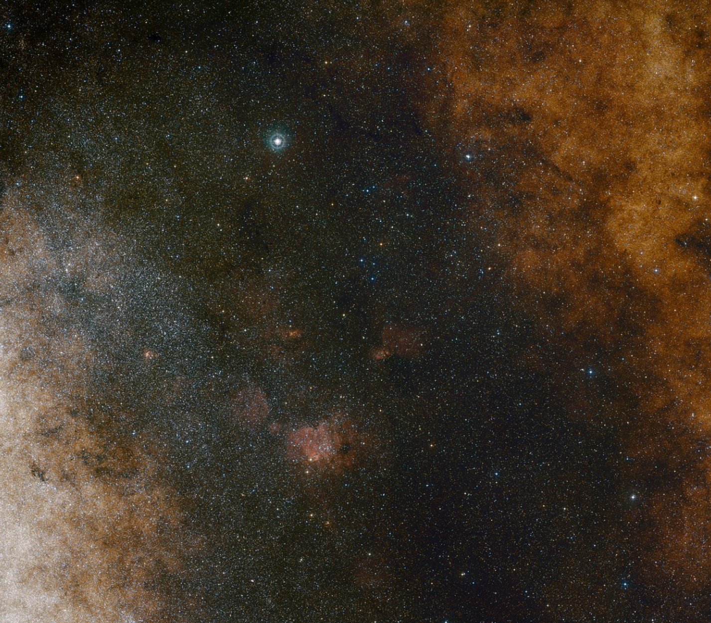 This visible light wide-field view shows the rich star clouds in the constellation of Sagittarius (the Archer) in the direction of the centre of our Milky Way galaxy. The entire image is filled with vast numbers of stars — but far more remain hidden behind clouds of dust and are only revealed in infrared images. This view was created from photographs in red and blue light and forming part of the Digitized Sky Survey 2. The field of view is approximately 3.5 degrees x 3.6 degrees.