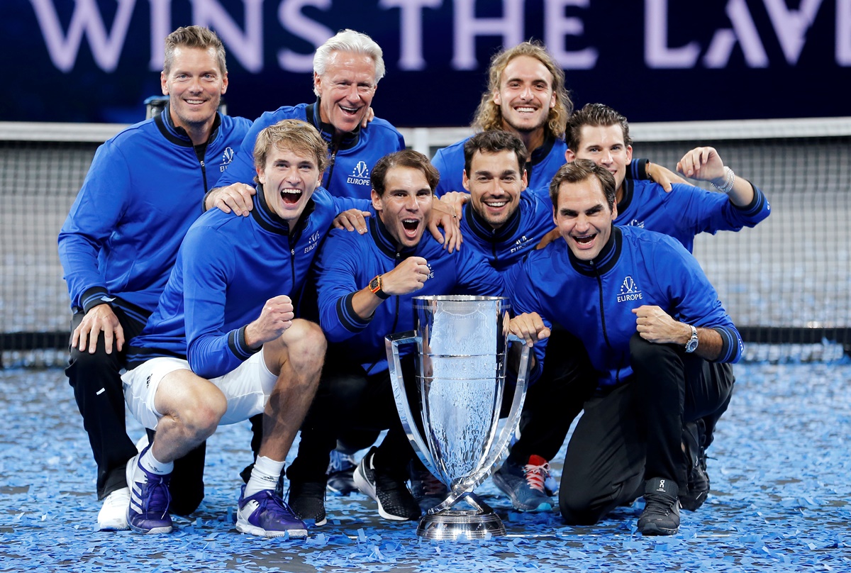 FILE PHOTO: Tennis - Laver Cup - Palexpo, Geneva, Switzerland - September 22, 2019  Team Europe captain Bjorn Borg, vice-captain Thomas Enqvist, Alexander Zverev, Dominic Thiem, Fabio Fognini, Stefanos Tsitsipas, Roger Federer and Rafael Nadal pose with the trophy after they win the Laver Cup  REUTERS