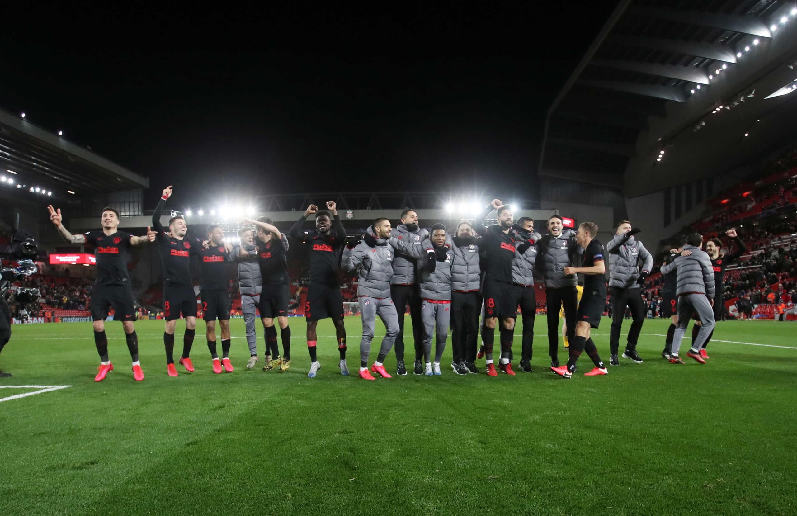 Soccer Football - Champions League - Round of 16 Second Leg - Liverpool v Atletico Madrid - Anfield, Liverpool, Britain - March 11, 2020  Atletico Madrid players celebrate in front of their fans after the match   Action Images via Reuters
