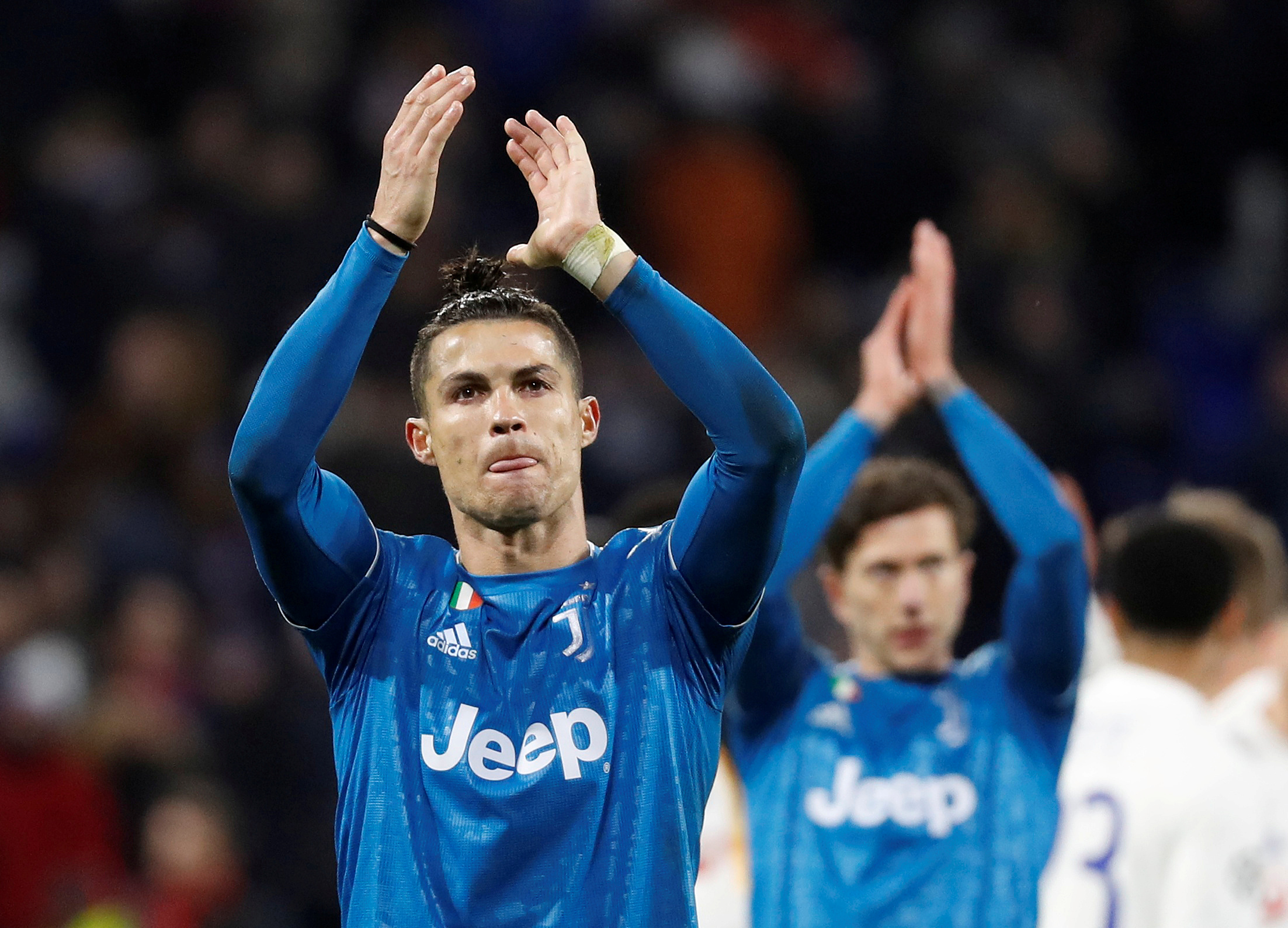 FILE PHOTO: Soccer Football - Champions League - Round of 16 First Leg - Olympique Lyonnais v Juventus - Groupama Stadium, Lyon, France - February 26, 2020  Juventus' Cristiano Ronaldo looks dejected as he applauds fans at the end of the match   REUTERS